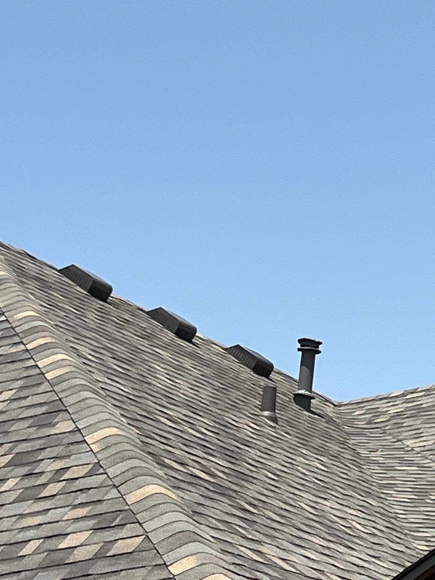 Red brick with IKO Cornerstone  by Tejas Roofworks + Restoration