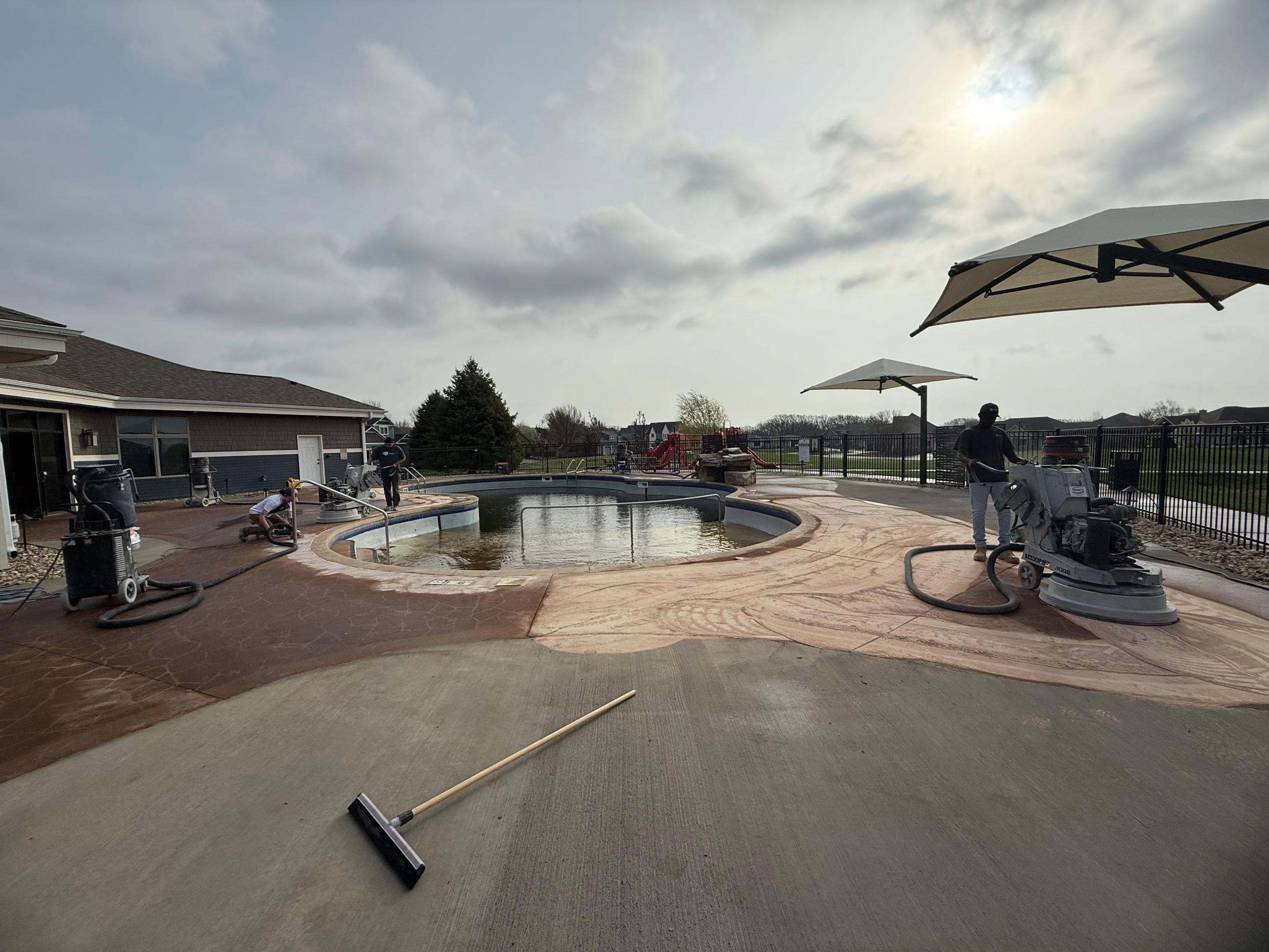 Arbors Edge Pool Deck Restoration and Textured Concrete Coating by Select Painting, Coatings & Garage Cabinets