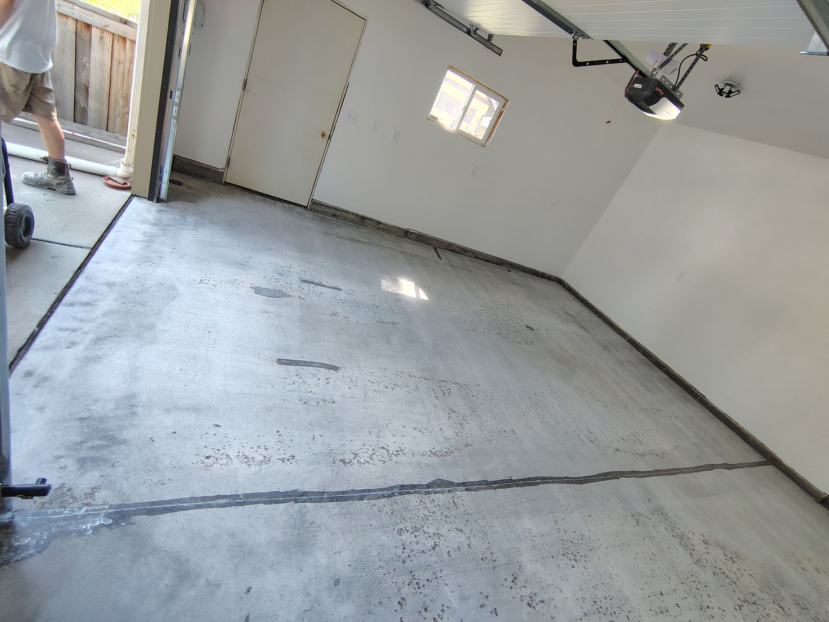 Epoxy Concrete Coating and Garage Floor Restoration in Sioux Falls by Select Painting, Coatings & Garage Cabinets