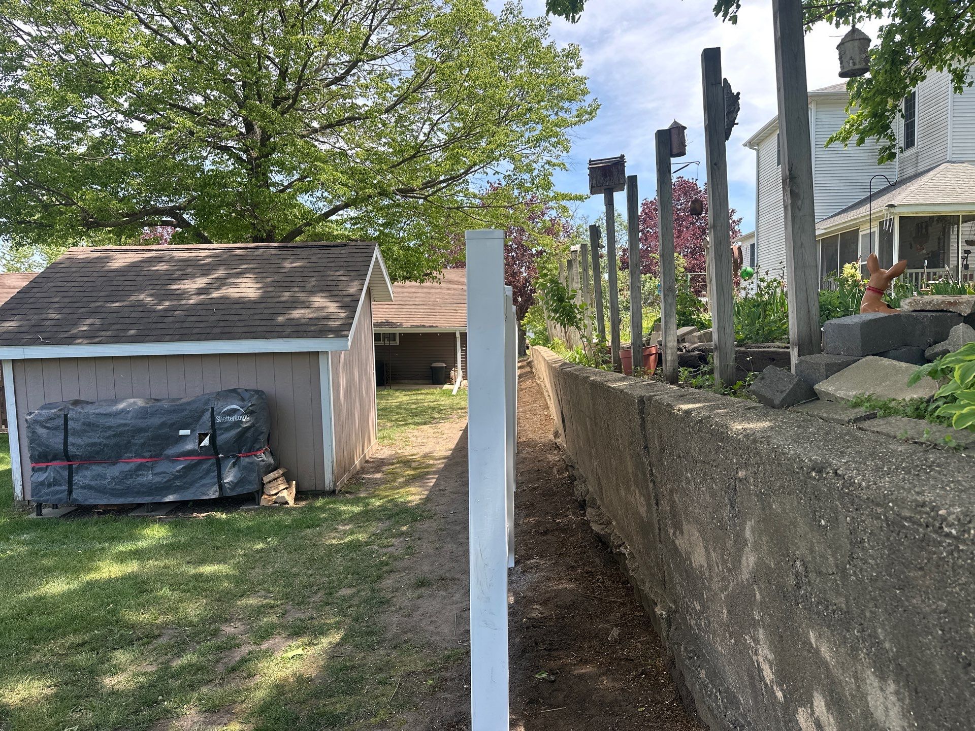 White Vinyl Privacy Fence Installation in Lawler, IA by Perfect Picket Fence and Stain