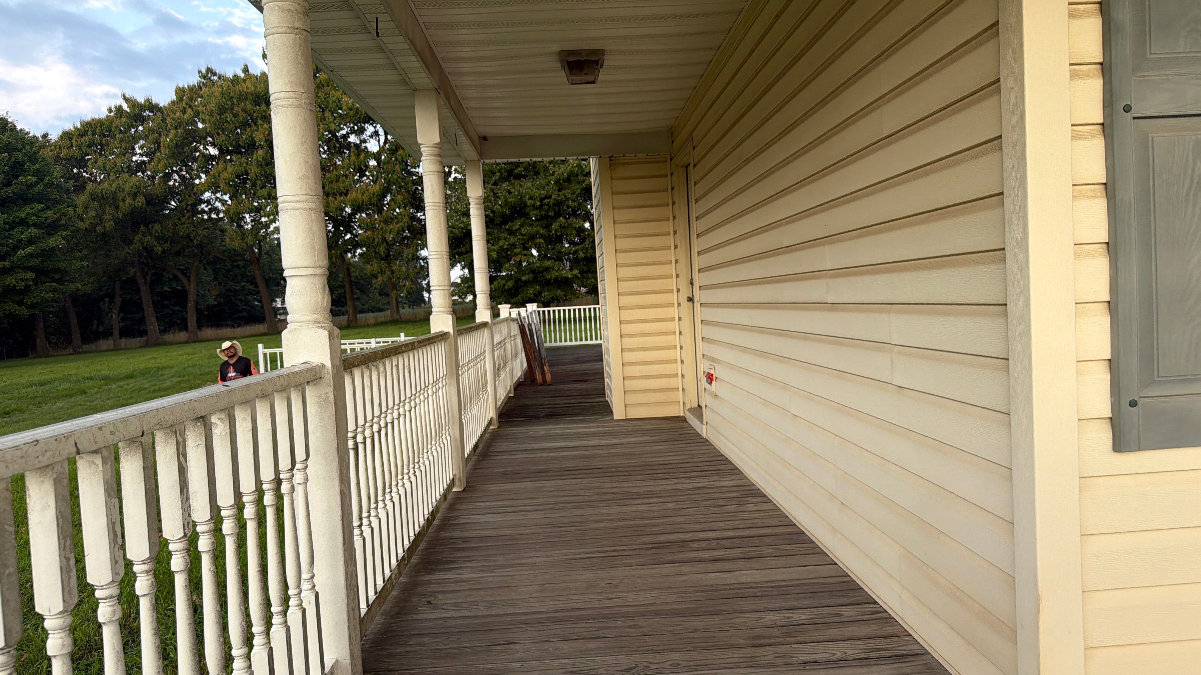 Vinyl Siding House Washing and Wood Deck Restoration in Carroll County by Baltimore Pressure Washers Inc.