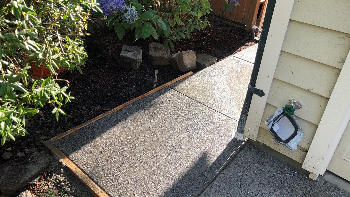 Joan | Concrete Driveway & Walkway   by Jireh Asphalt & Concrete Inc 