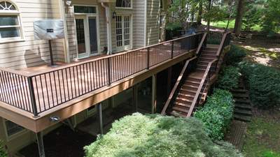 Full James Hardie Siding Replacement and Trex Deck Resurface in the Saddle Color