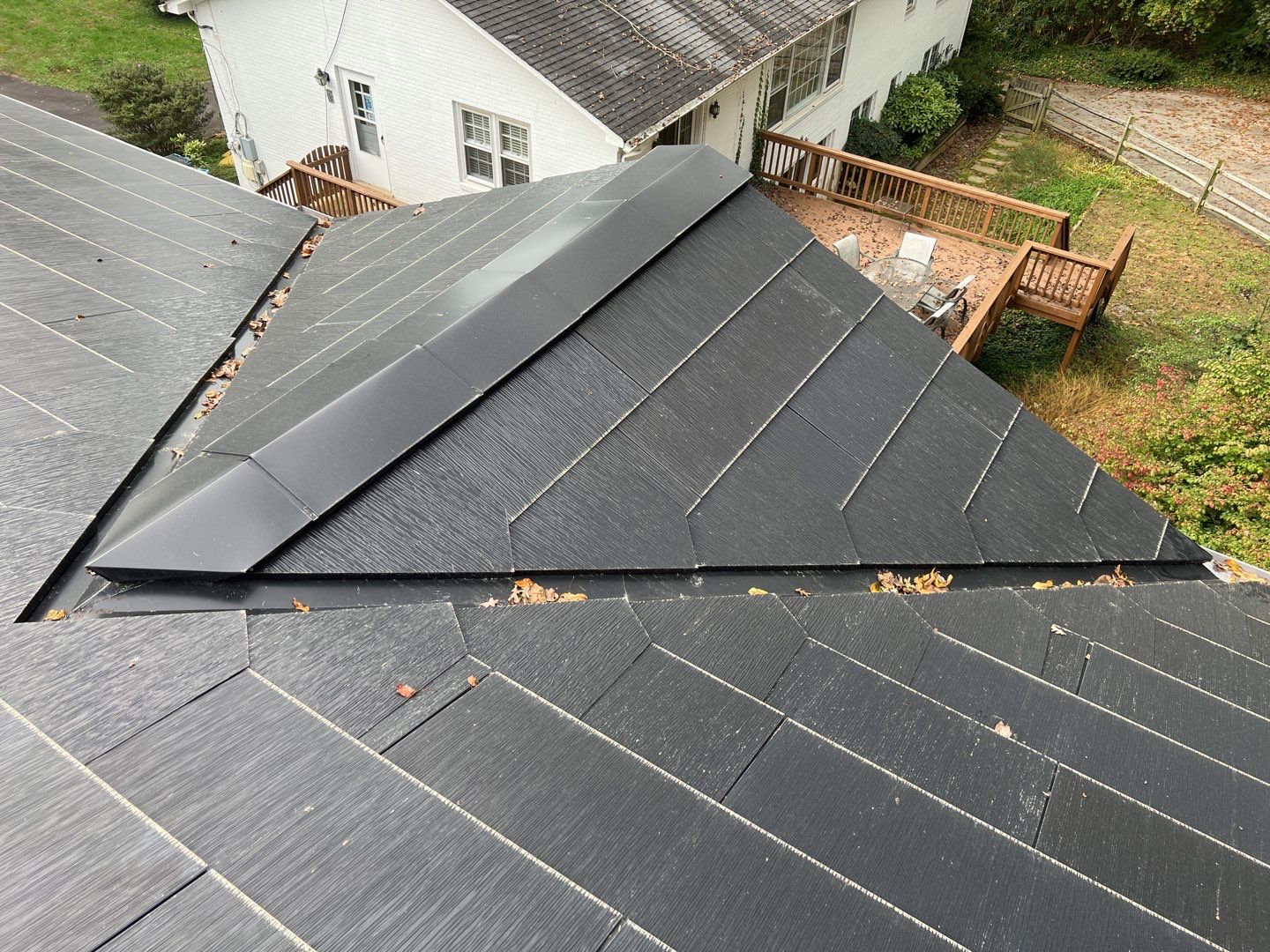 Tesla Solar Roof Replacement using Tesla Solar Roof V3 Tiles by American Home Contractors