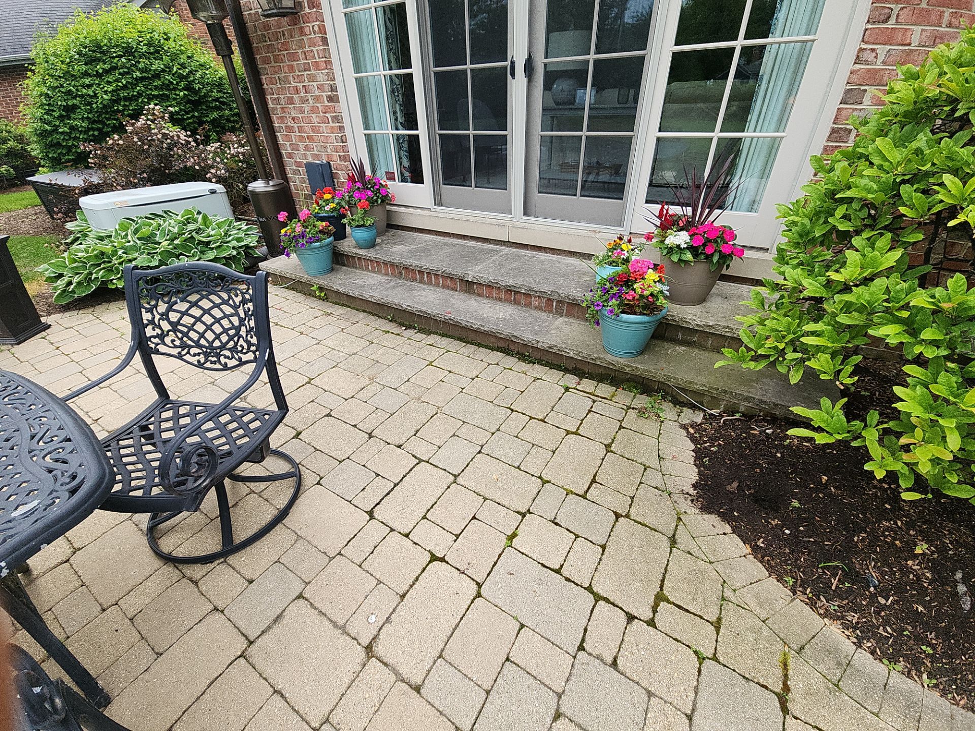 Brick paver repair, cleaning sanding and sealing by Northern Power Washing LLC.