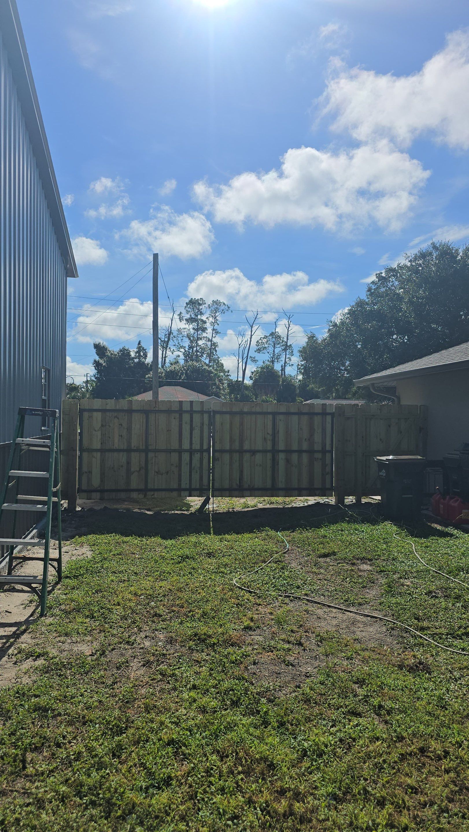Pressure-Treated Wood Privacy Fence and Gate Installation in North Port by True Fence LLC