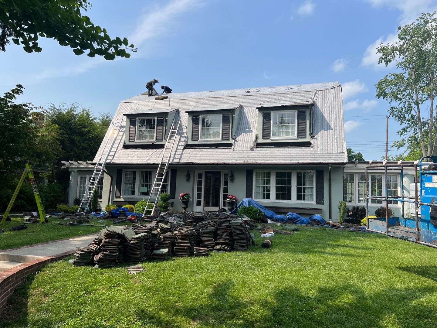 Slate removal/Cedar Shake replacement by Storm Contracting 