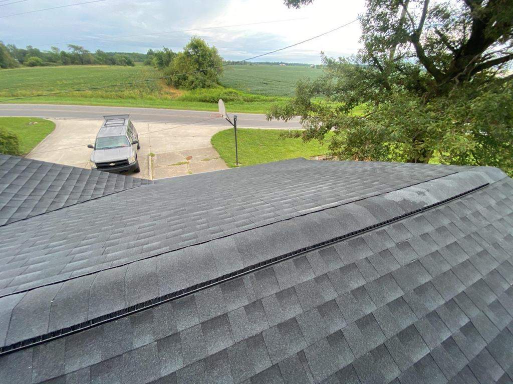 Storm damage roof replacement by Nitro Roofing and Construction