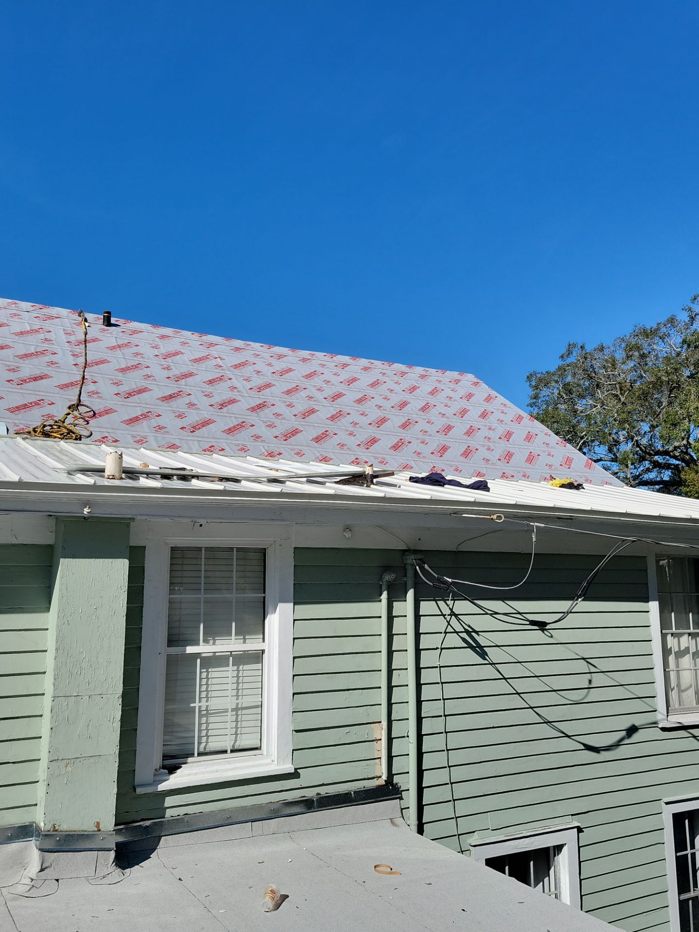 Residential Roofing Installation using Aluminum Metal Roof by Galaxy Builders, Inc.