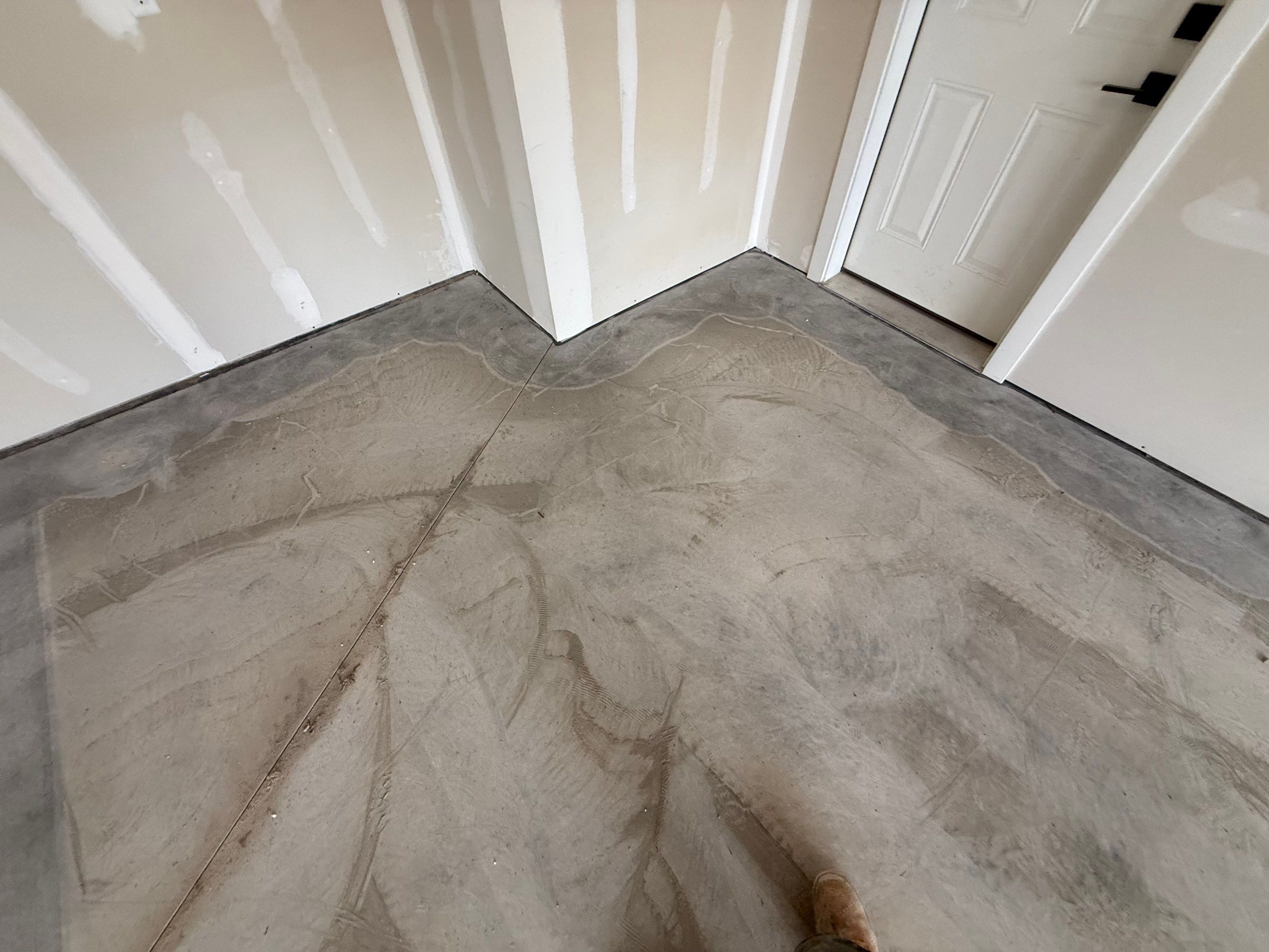 Grey Speckled Epoxy Floor Coating for Sioux Falls Garage by Select Painting, Coatings & Garage Cabinets