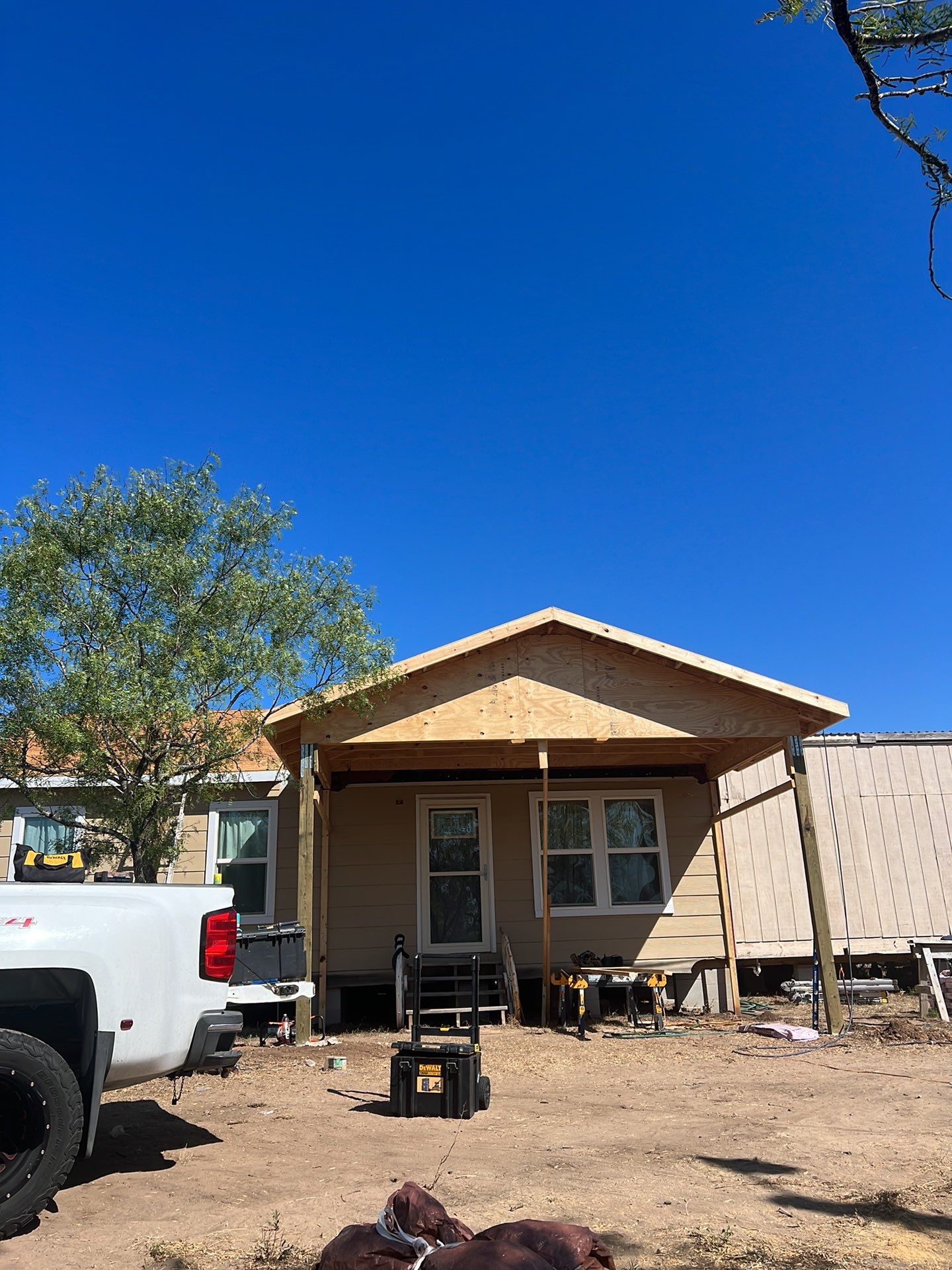 Front Porch Sitt'n by Bayfront Roofing and Construction