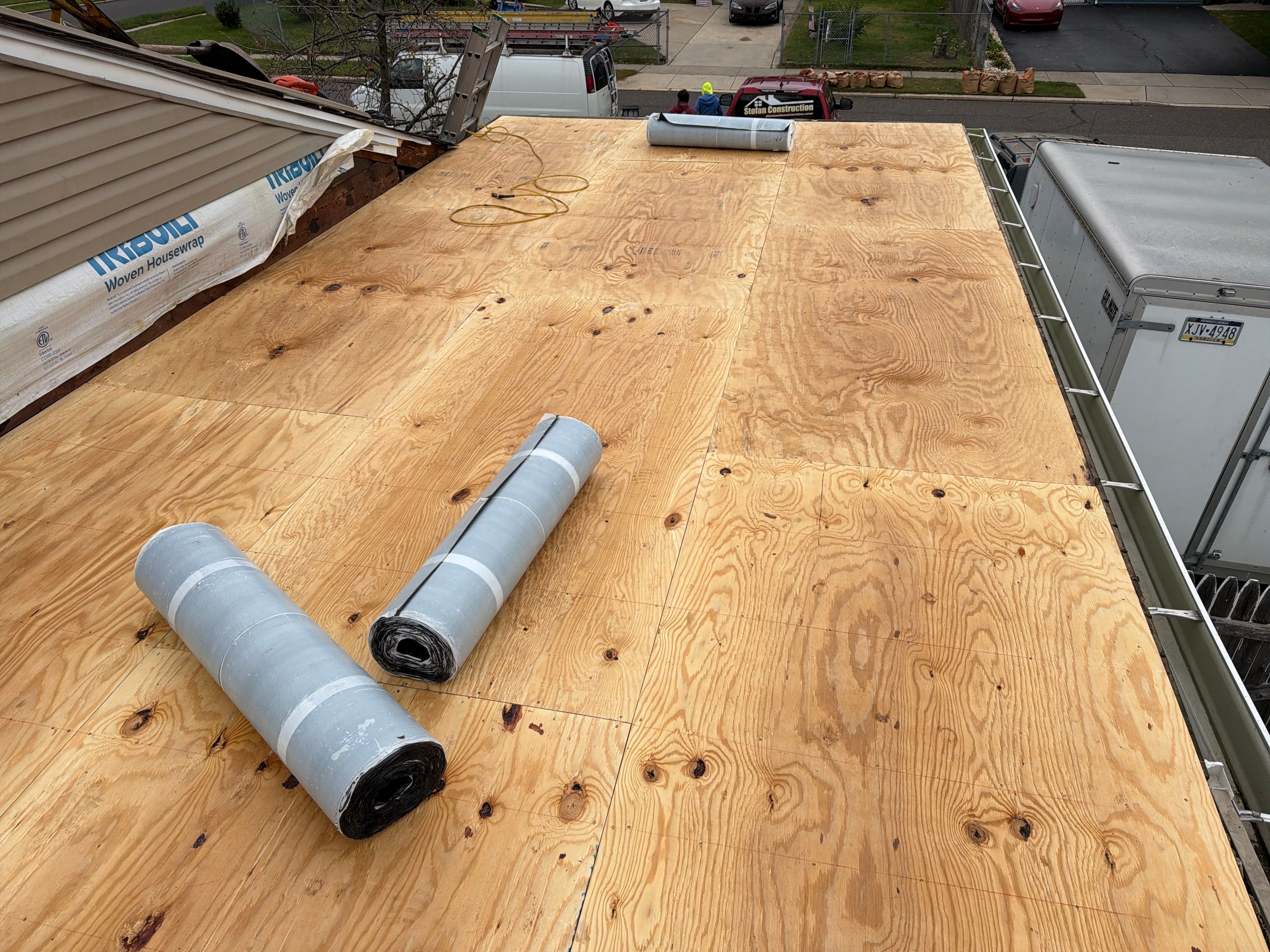 Flat Roof Replacement and Shingle Integration in Levittown by Stofan Construction LLC