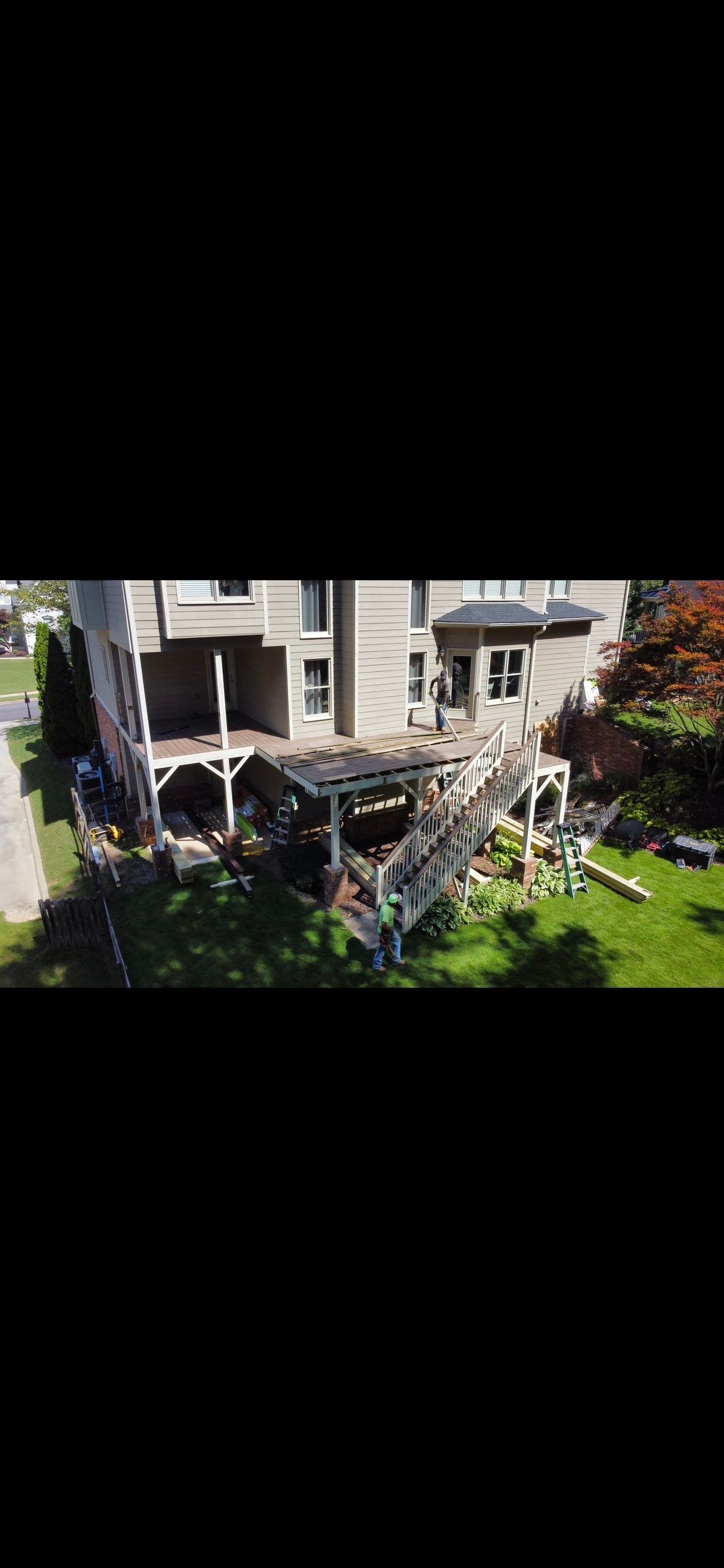 Multi-Level Composite Deck and Screened Porch in Acworth by Swift Home Renovations 