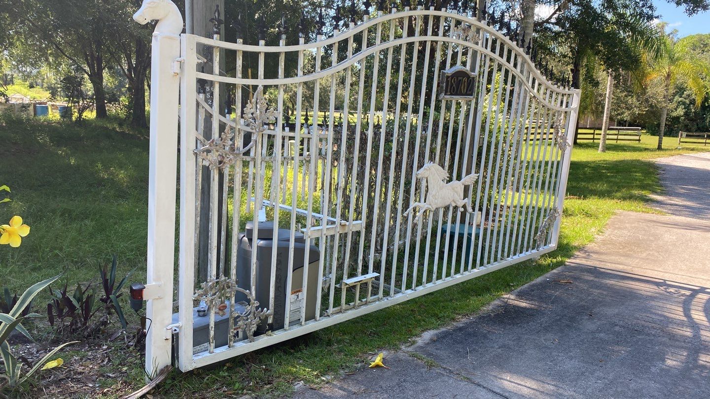 Bradenton, FL Gate Operator Installation & Horizontal Privacy Fence by Asap fence and gates, LLC