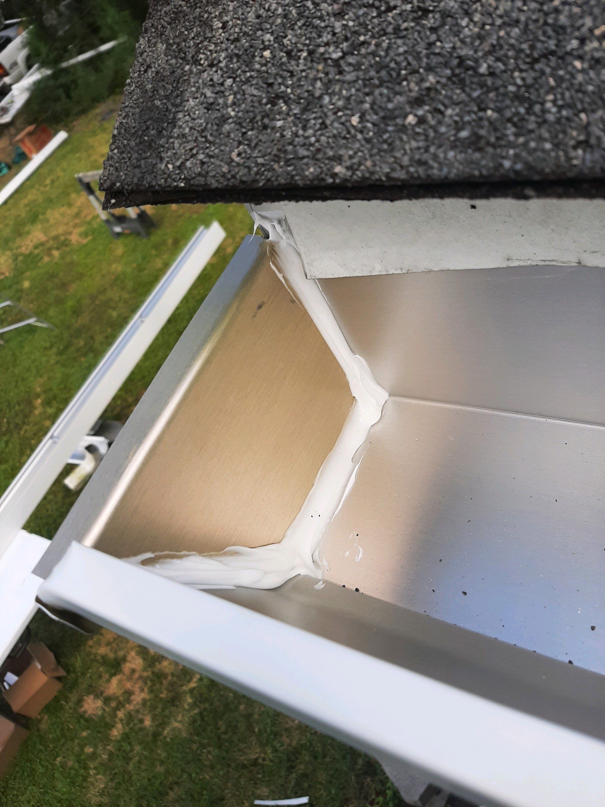 Gutter Installation using White K-Style Seamless Gutters by Gutter Professors