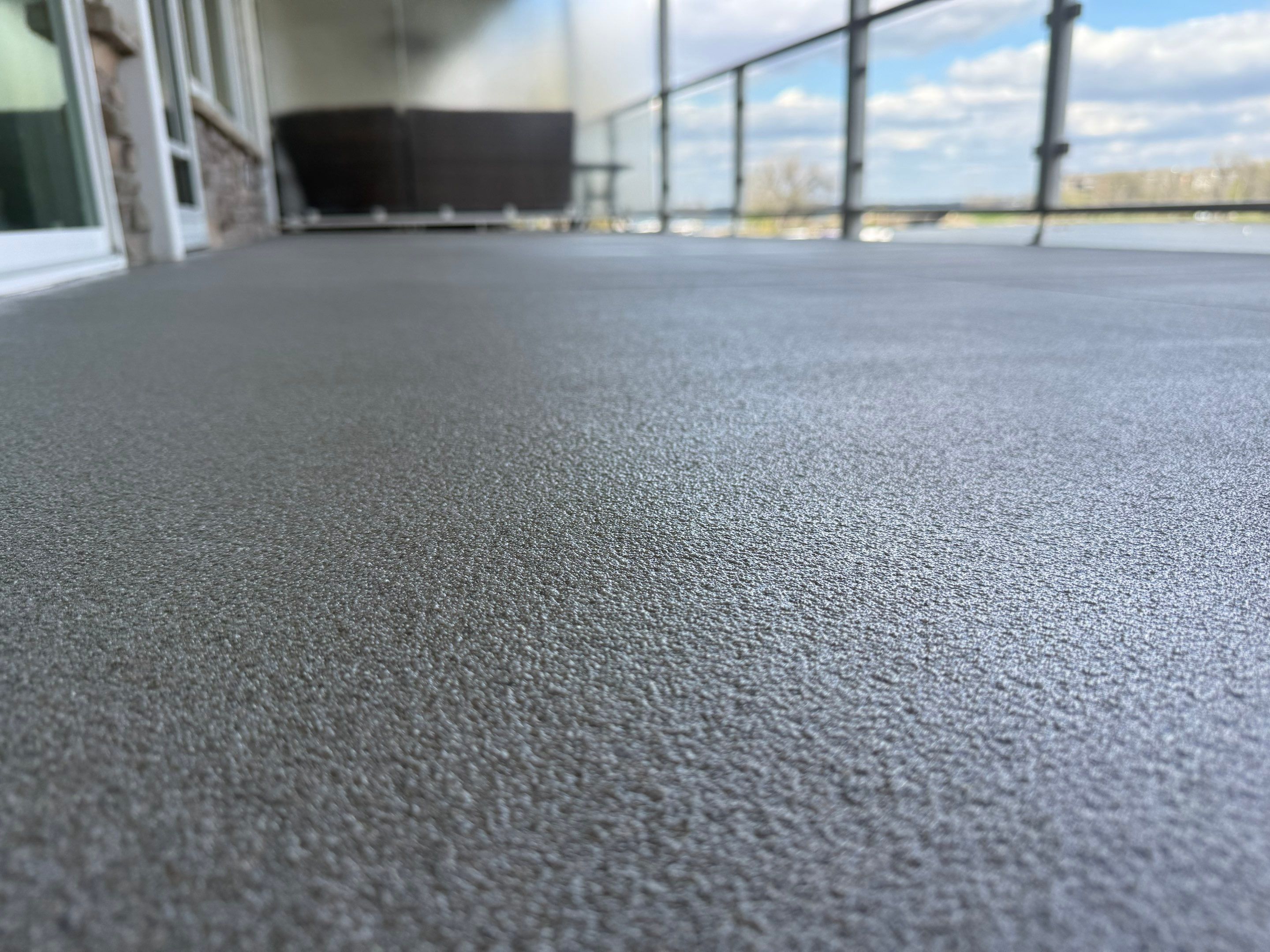 Dark Gray Slip-Resistant Concrete Coating for Arnolds Park Balcony by Select Painting, Coatings & Garage Cabinets