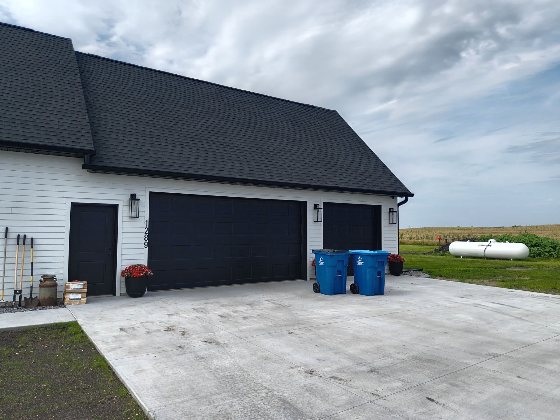 6" Black Seamless Gutter Installation by Next Level Seamless Gutters / Exteriors Inc.