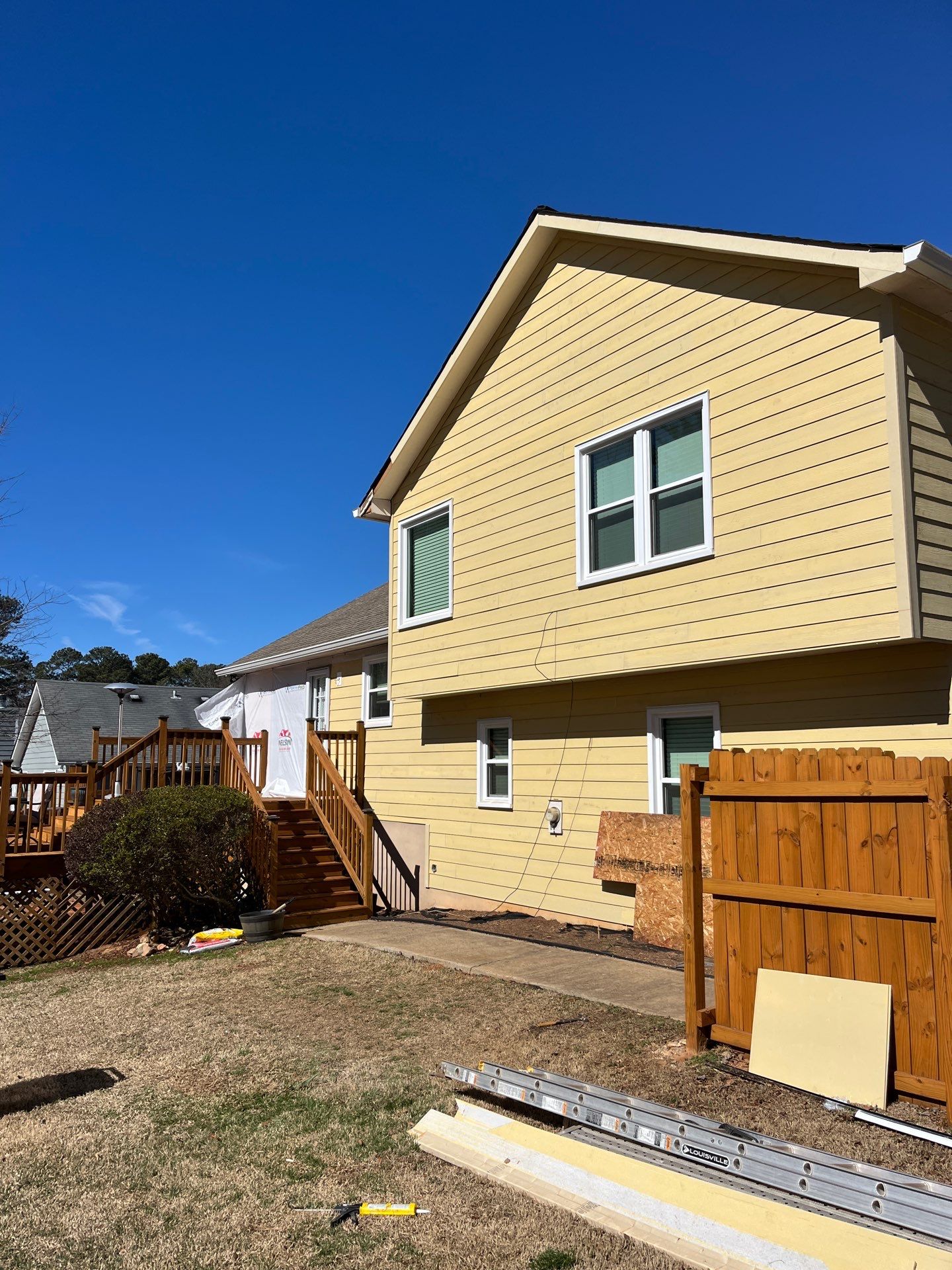 Acworth, GA James Hardie Board and Batten Siding Installation, Porch Renovation, Exterior Painting, and Window Replacement by Nelson Exteriors 