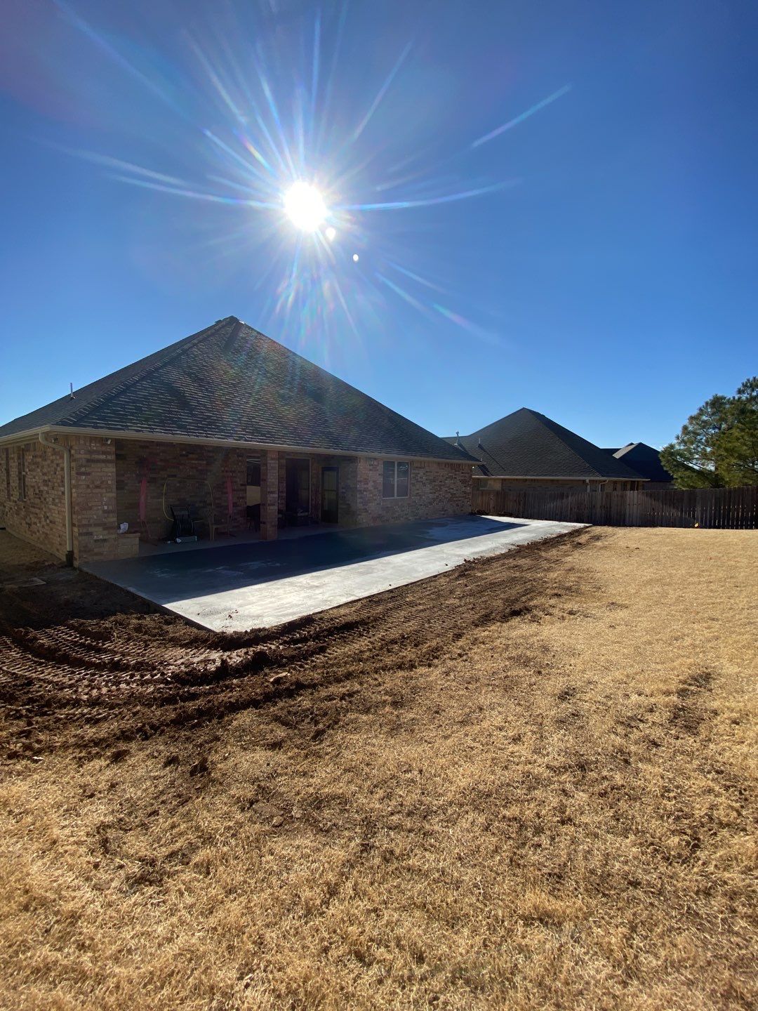 Concrete Slab , Retaining Wall , Fence, and landscape. by Clays Services Inc
