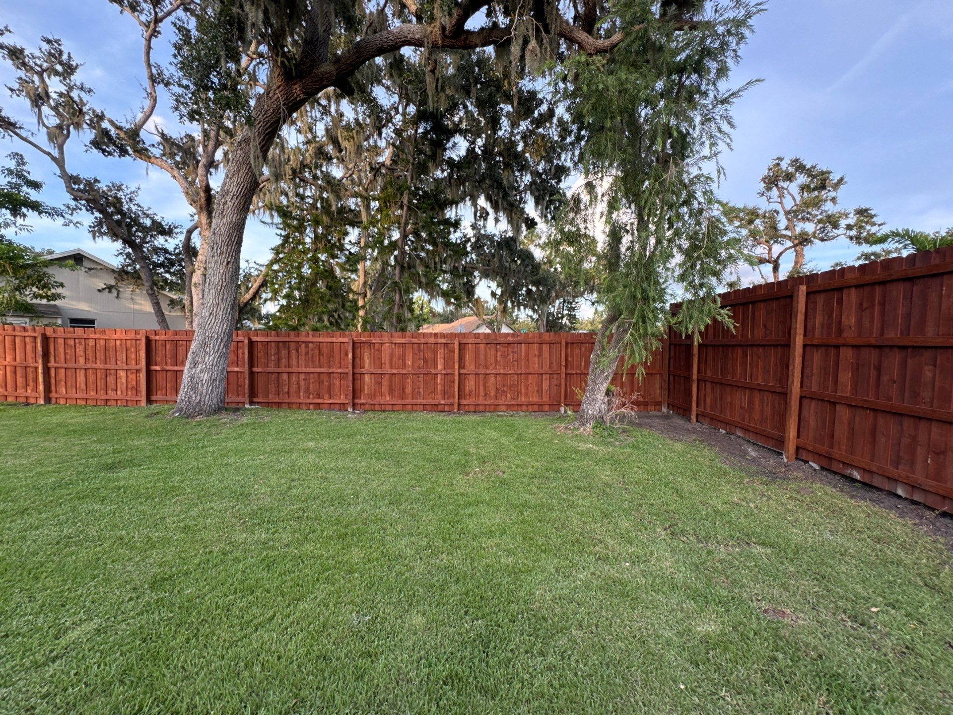 Wood Fence Installation using Pre-stained Pine Board On Board by Asap fence and gates, LLC