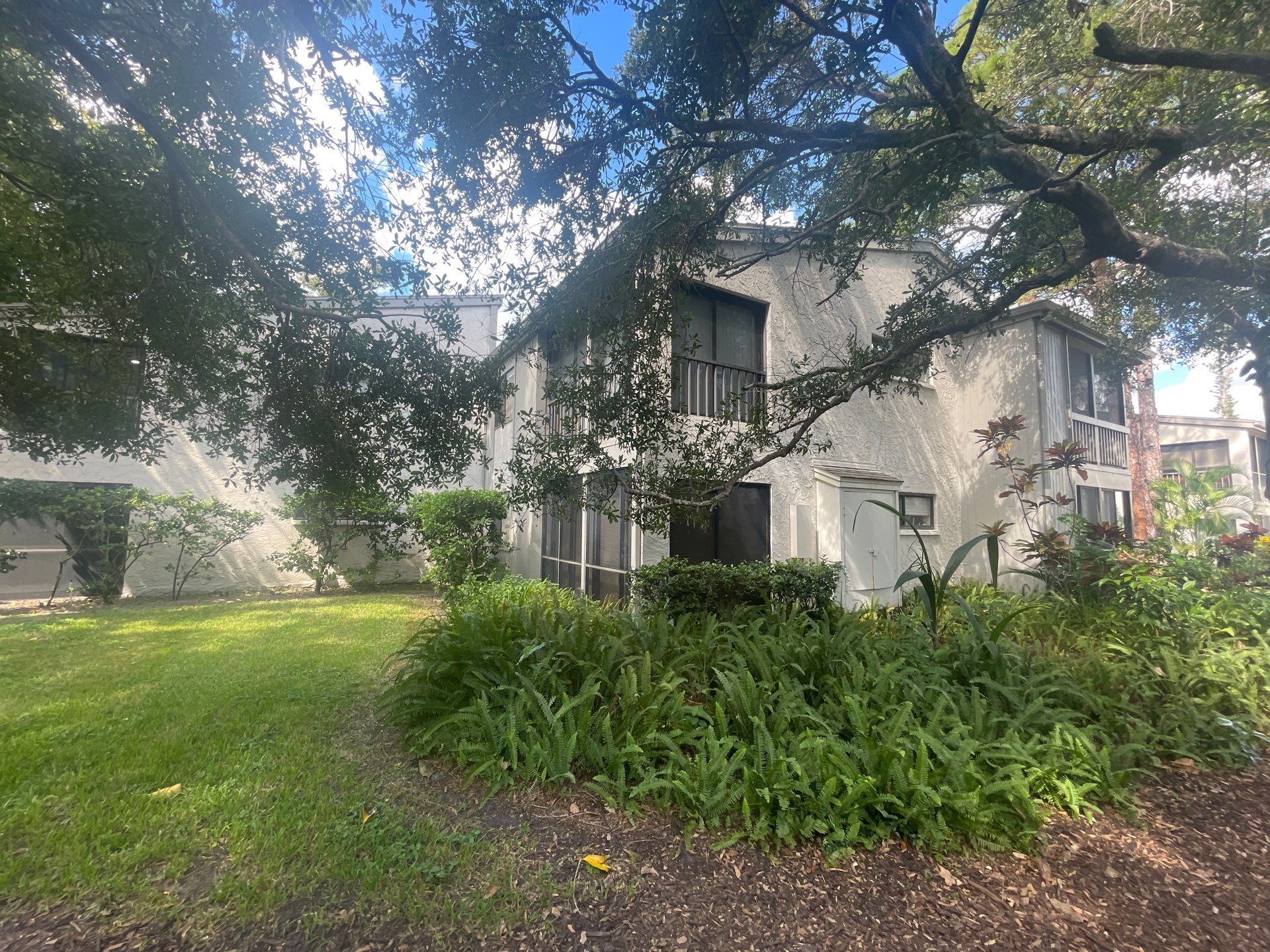 Clean Gutters and Roof in Sarasota FL by Gutter Professors