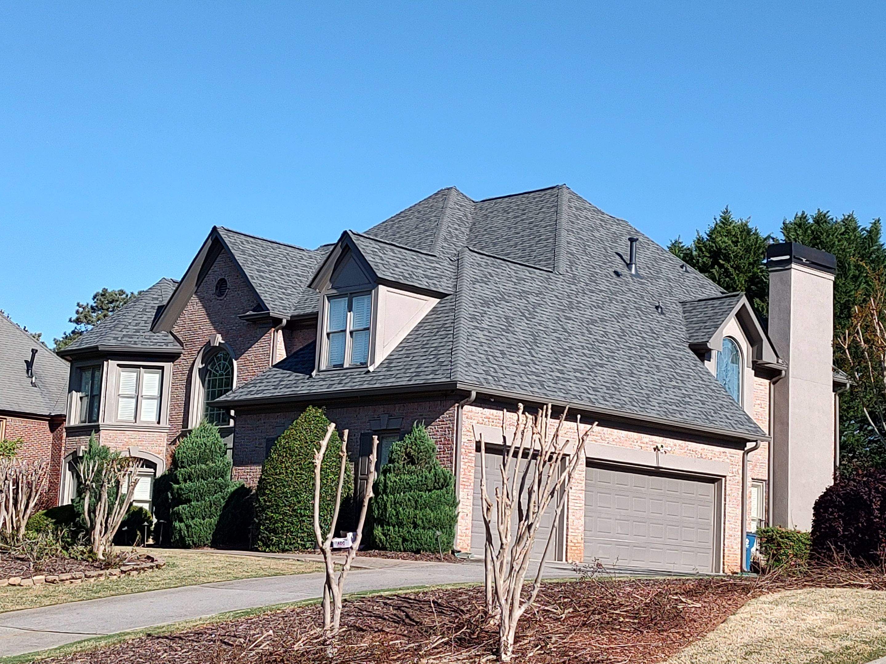 Top-Quality Williamsburg Gray Owens Corning Roof Installation in Roswell, Georgia by NBS Roofing by NBS Roofing, Inc.