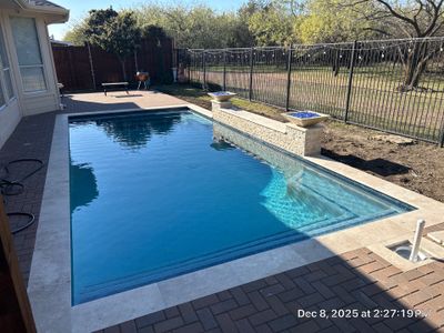 Geometric Pool with Pergola and Outdoor Kitchen