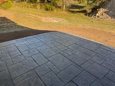Stamped English Rivenstone concrete patio and sidewalks 