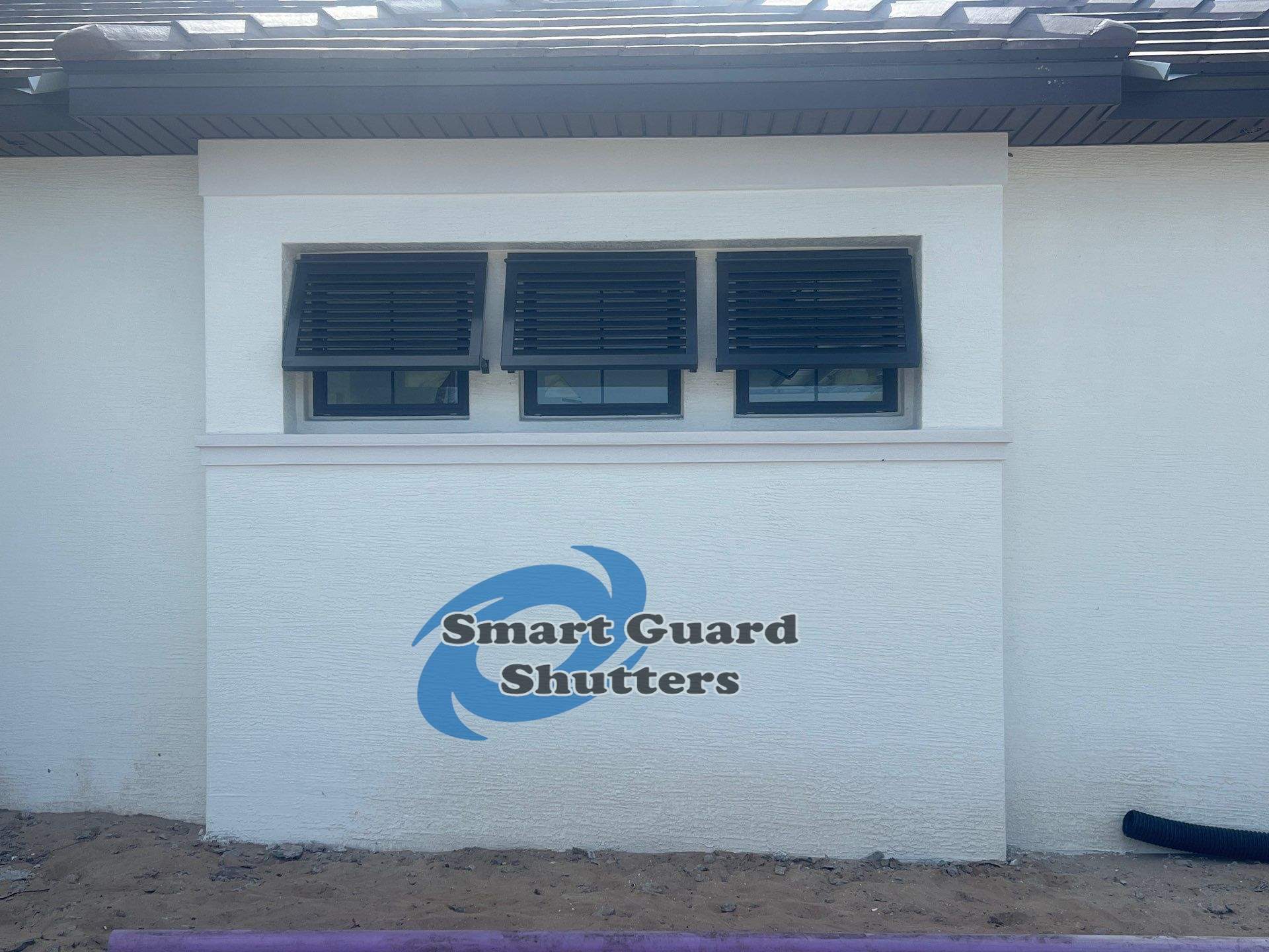 Decorative Bahamas in Umbra Grey by Smart Guard Shutters