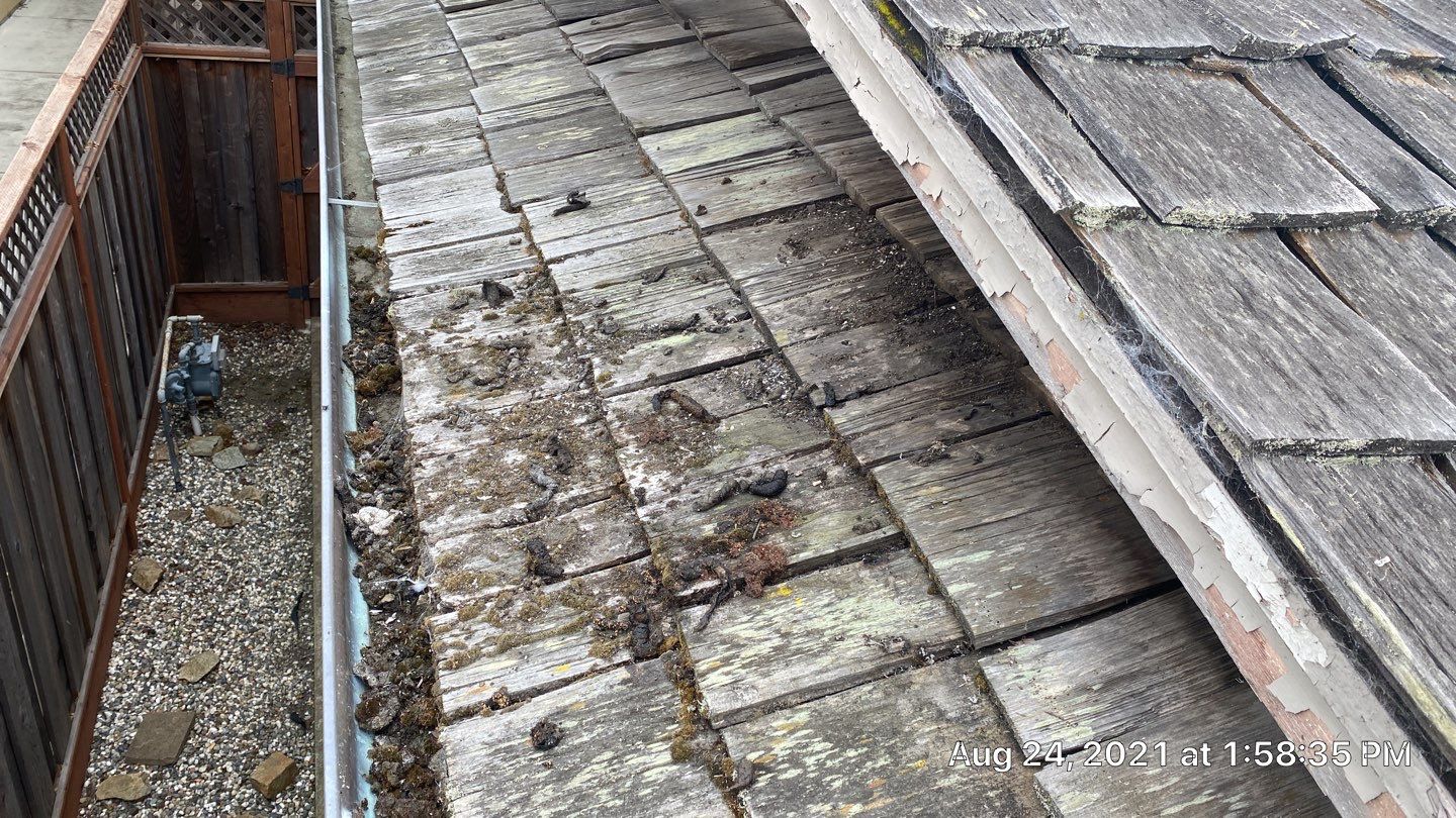 Refurbish and repair shake roof to get ready to sell by Straight Edge Roofing Inc