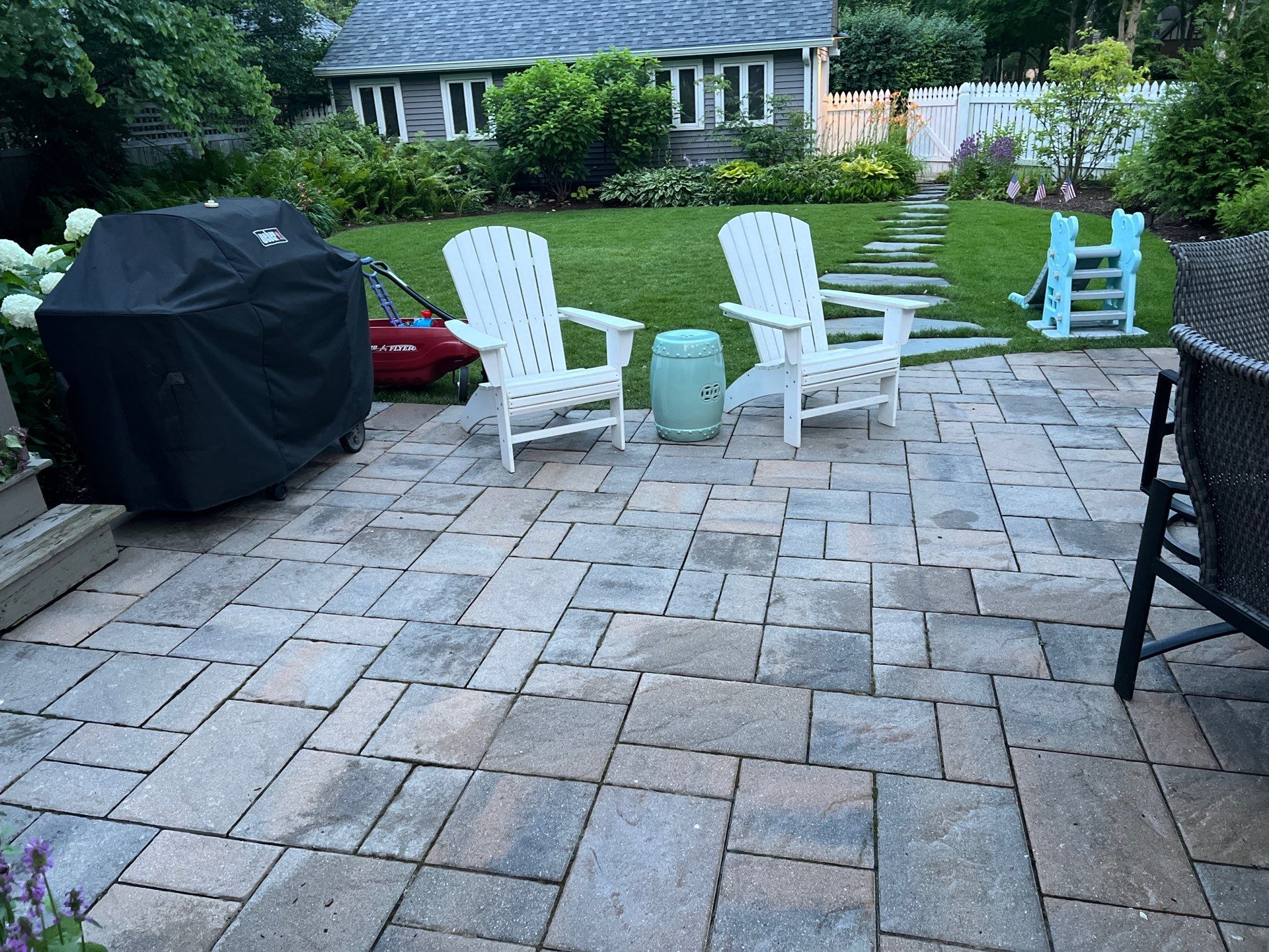 concrete cleaning using Algaecide, soft wash soap by Northern Power Washing LLC.