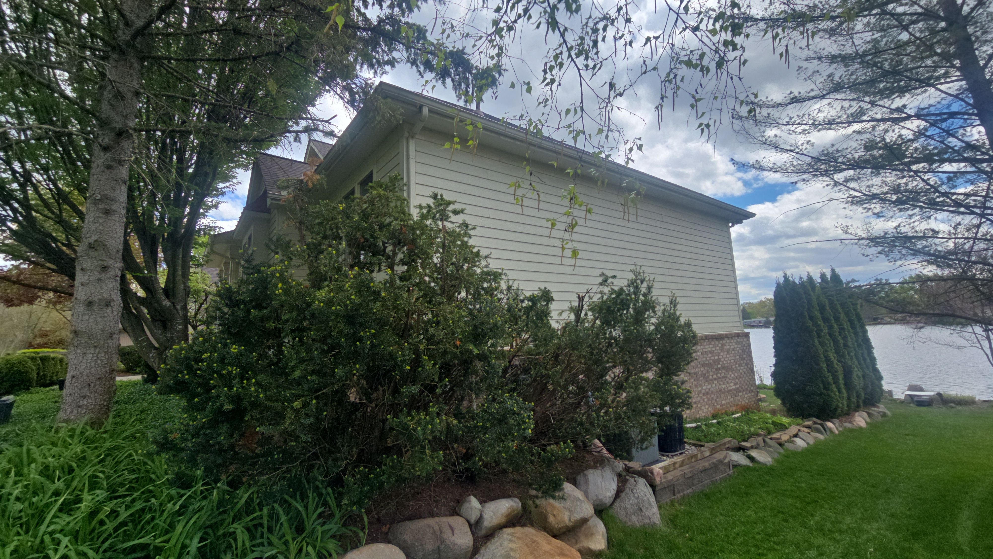 Exterior Wood Rot Repair and Trim Restoration in White Lake by Top Shelf Painter