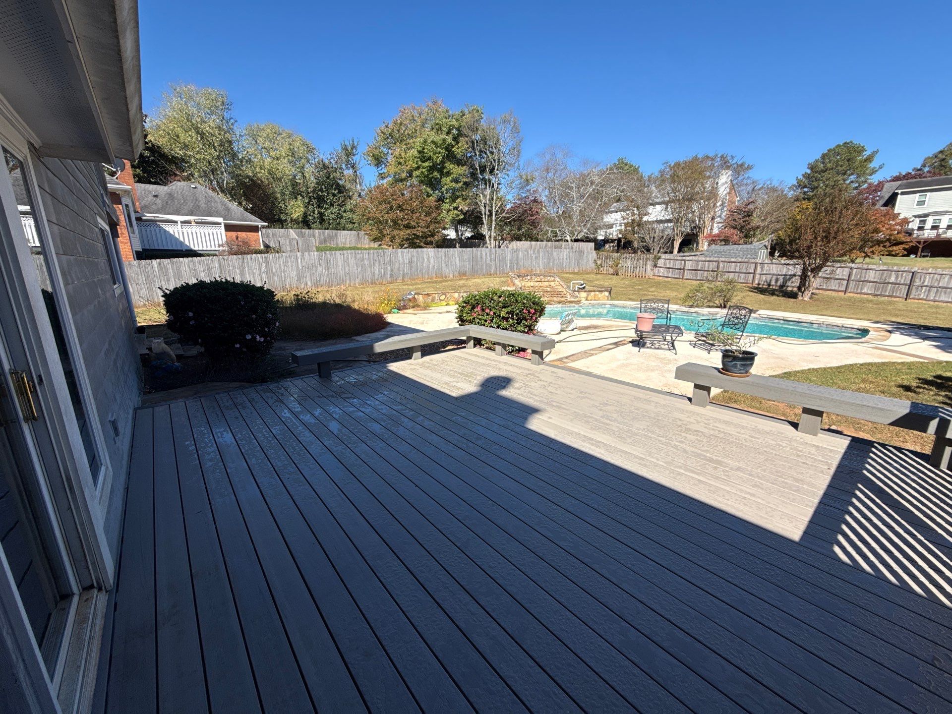 Custom Composite Deck with Integrated Seating in Roswell by Swift Home Renovations