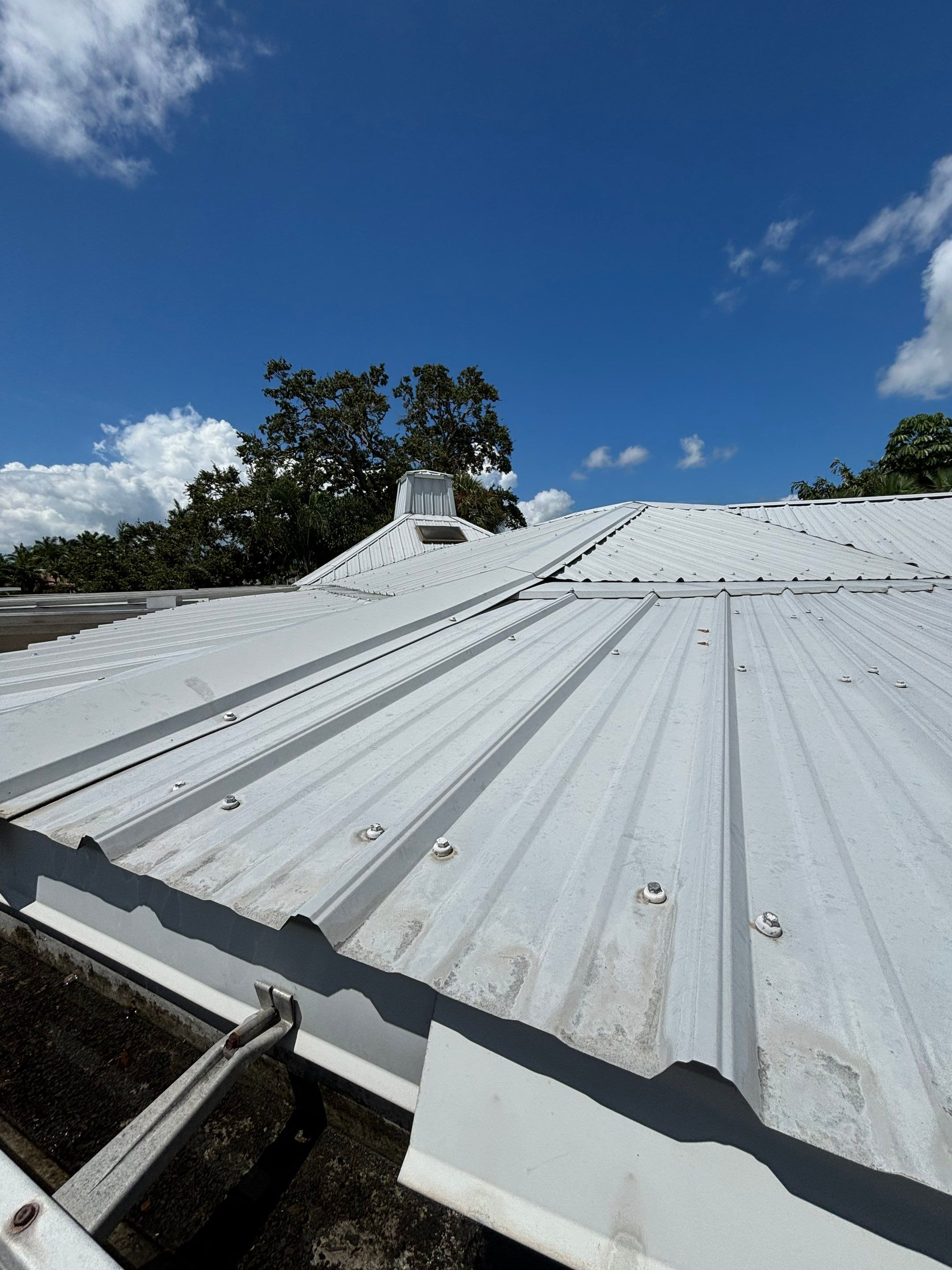 Rustic Red Exposed Fastener by Reimagine Roofing