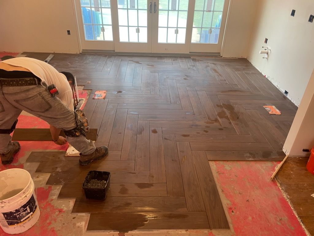 Herringbone Floor install w/ Subway Tile Backsplash by Footprints Floors Morristown