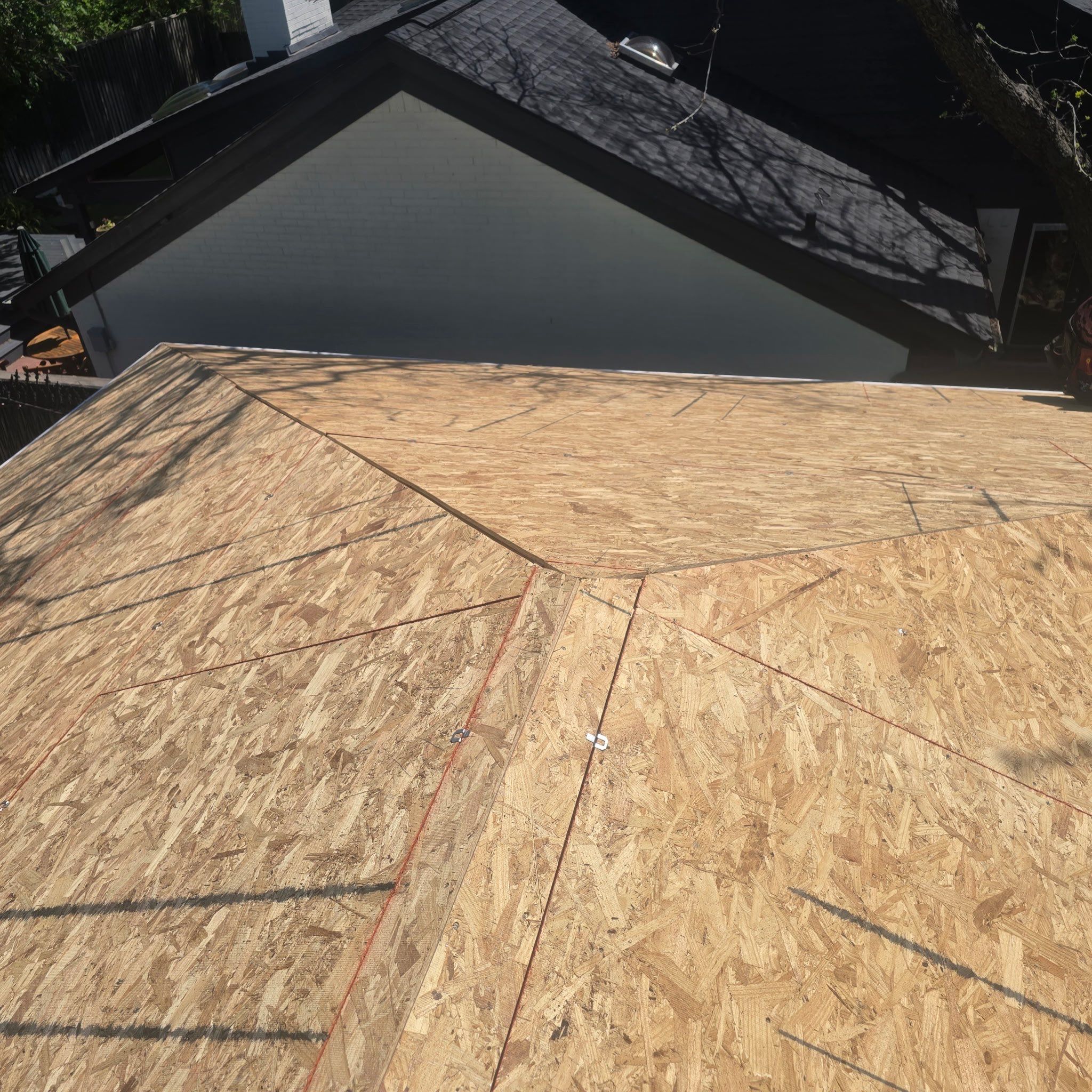 Home Addition Roof Install in Progress by Harvey Roofing & Construction