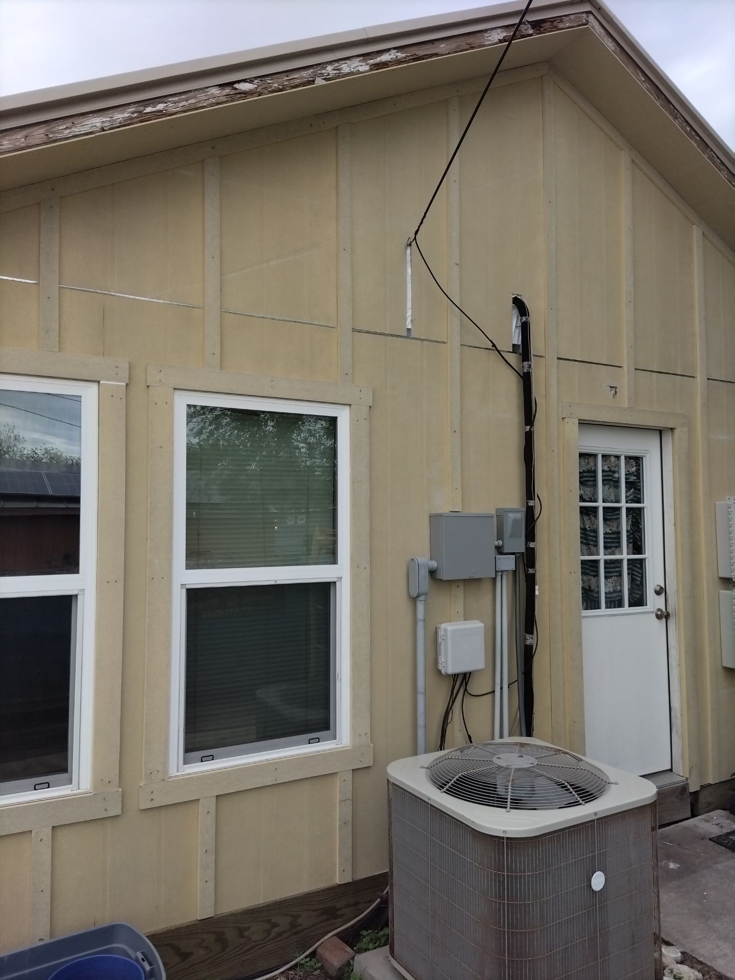 Vinyl to Hardie by Bayfront Roofing and Construction