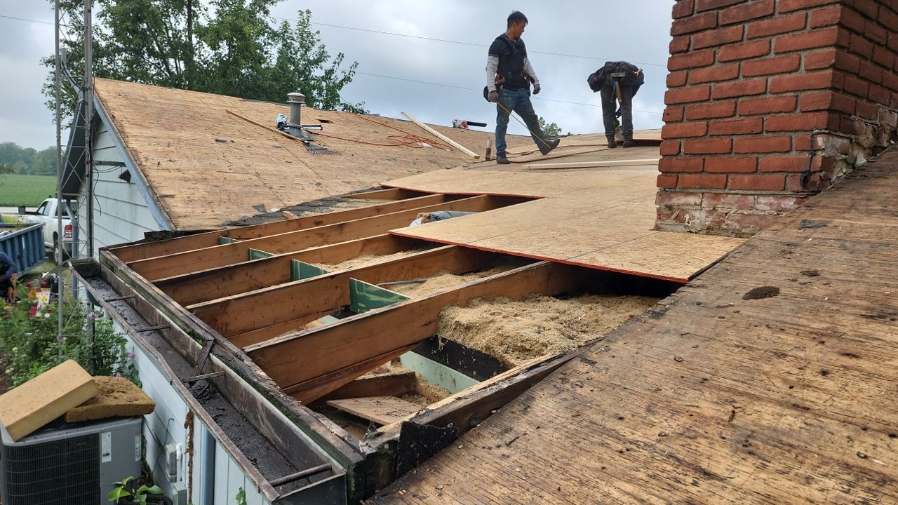 Residential Roofing Installation using 60 mil rubber roof  by Nitro Roofing and Construction