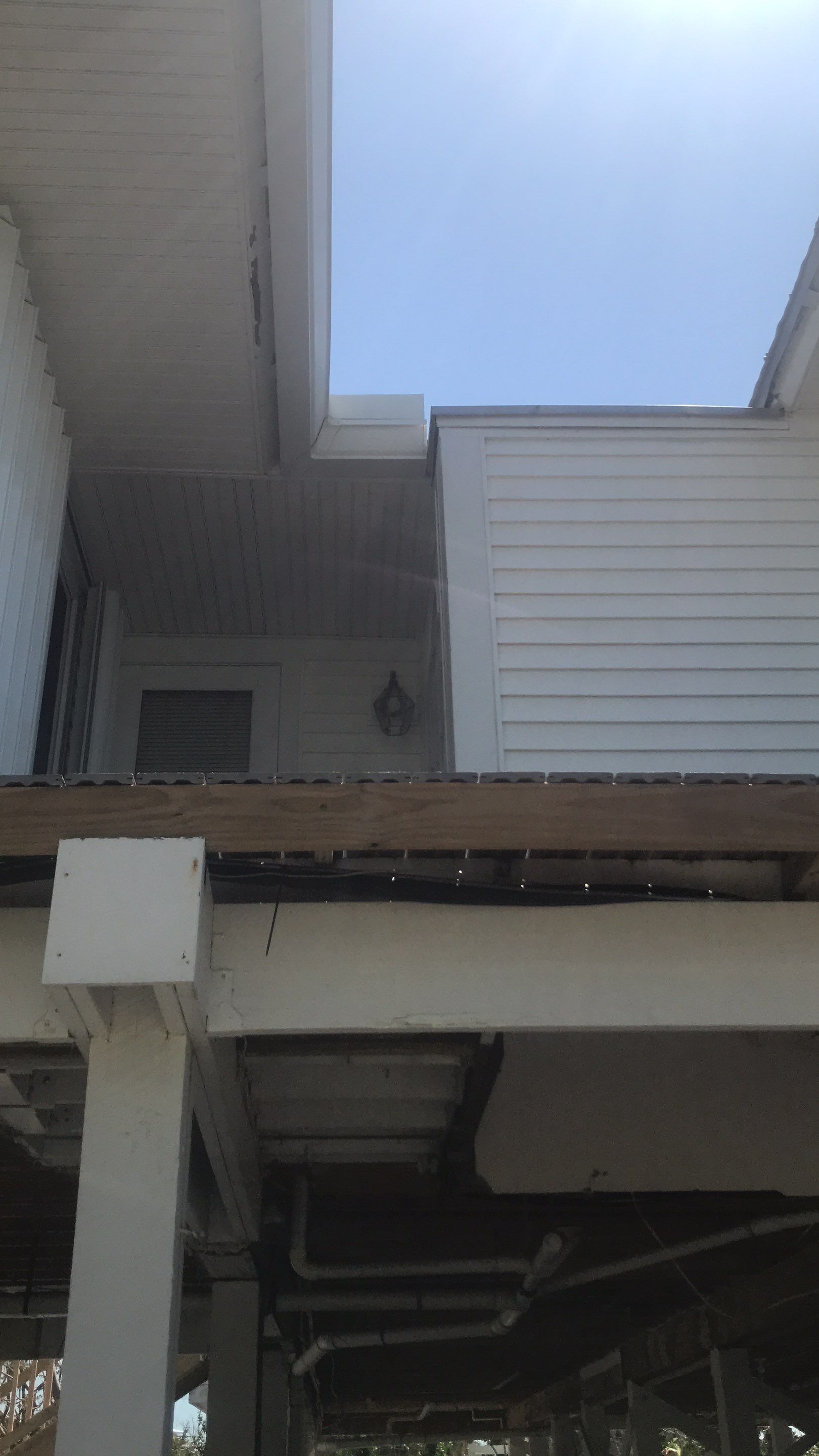 Downspout Installation using Downspout Extension in Sanibel FL by Gutter Professors