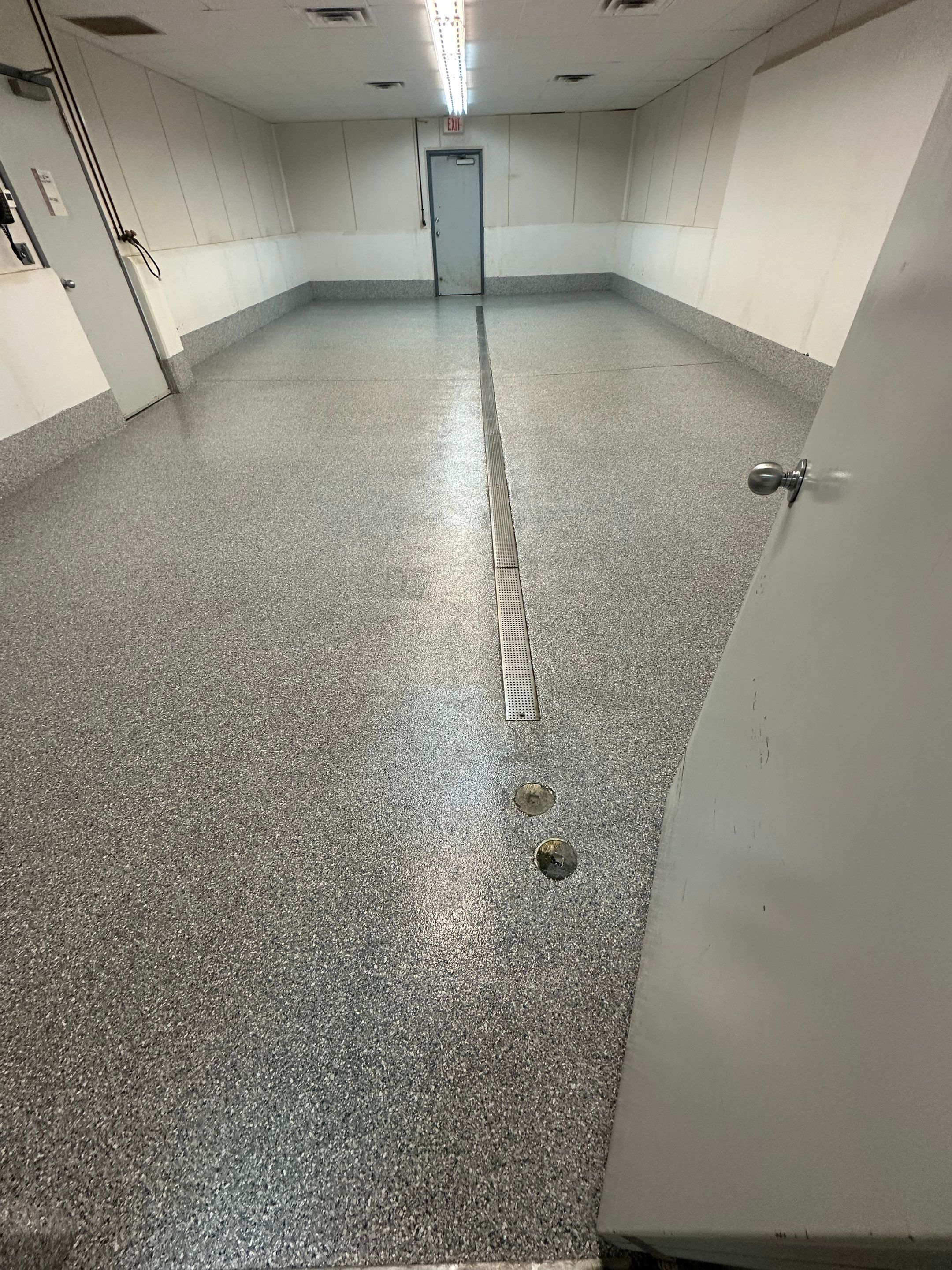 Durable Commercial Concrete Coatings for Brandon Valley Veterinary Clinic by Select Painting, Coatings & Garage Cabinets
