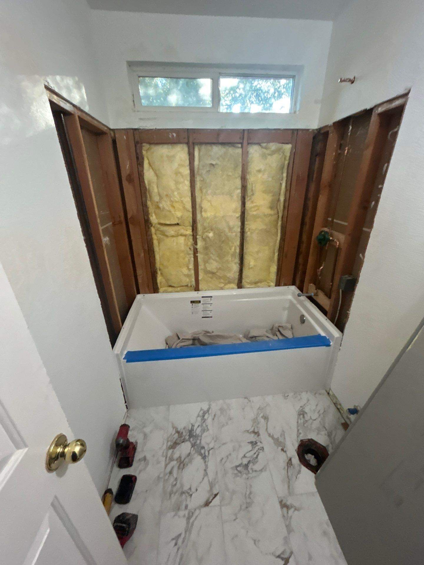 Bathroom Remodel Featuring Marble Stone Panels in Vacaville by H4H Remodeling and Repairs Inc.