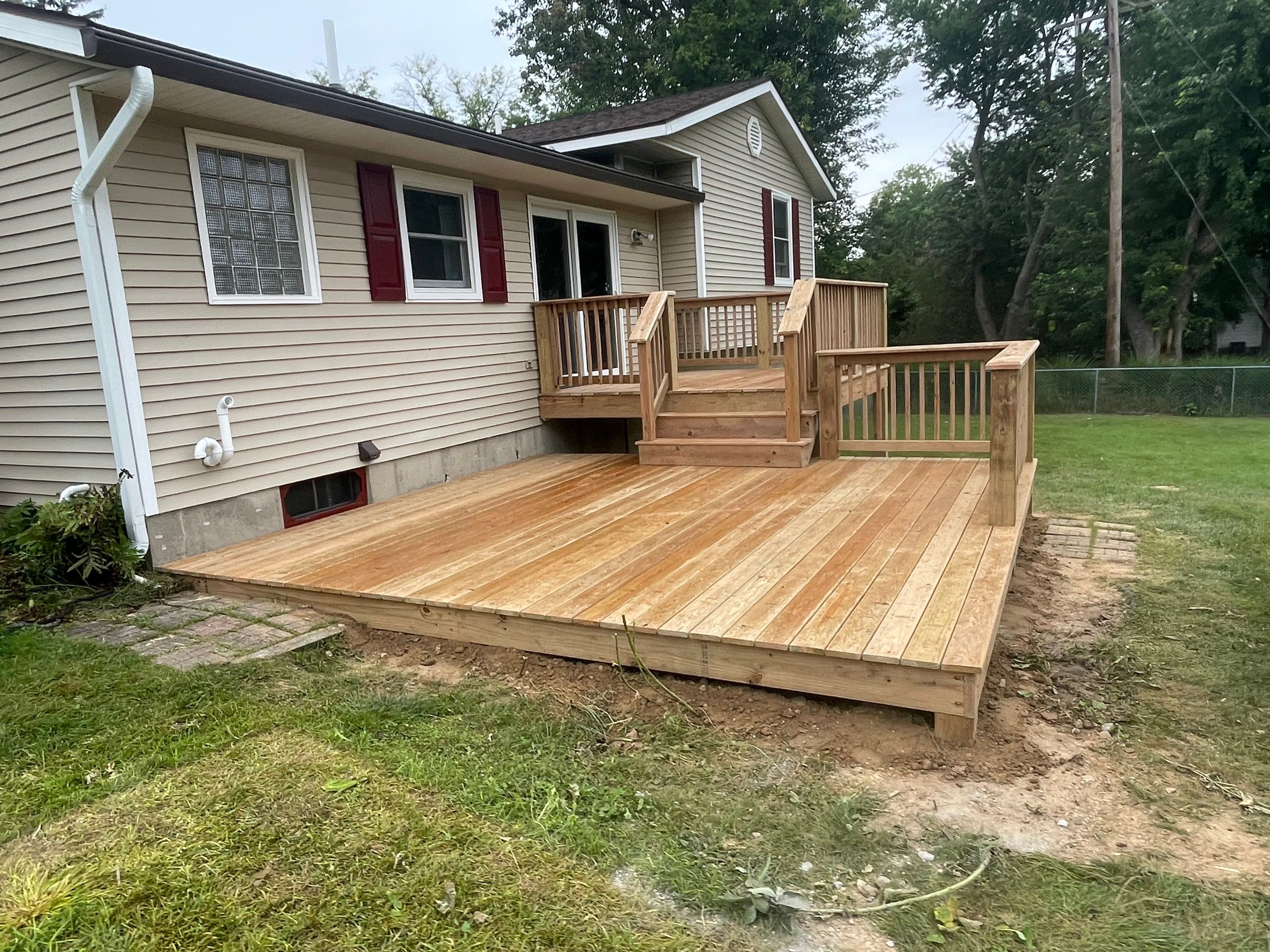 Deck Installation using Treated Lumber by Avalon Roofing and Exteriors
