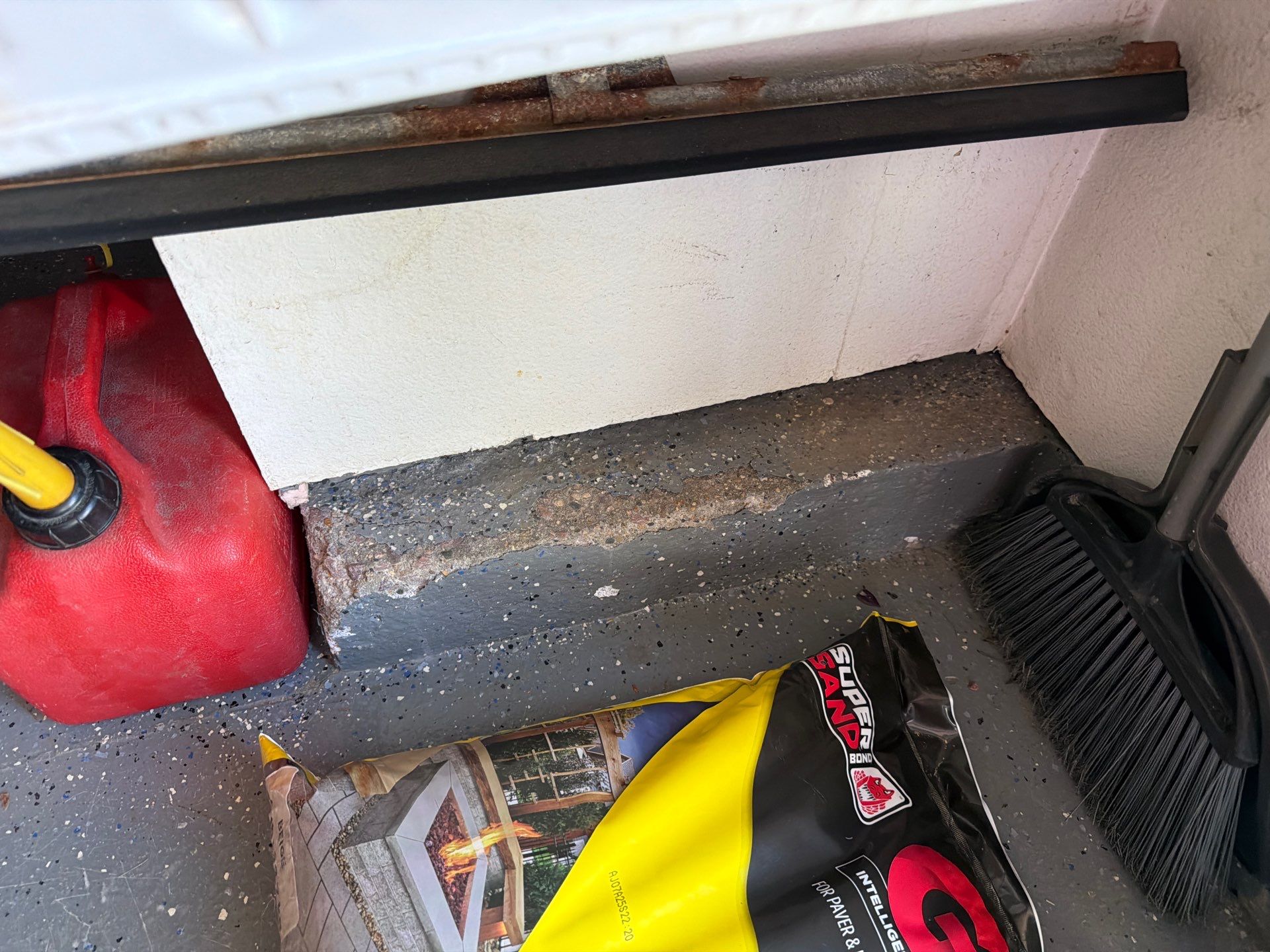 Multi-Car Garage Concrete Coating with Coyote Flake Finish in Sioux Falls by Select Painting, Coatings & Garage Cabinets