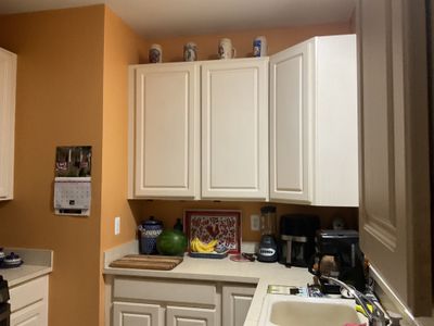 Modern Navy Blue Cabinet Refacing with Quartz countertop replacement in Harrison Township