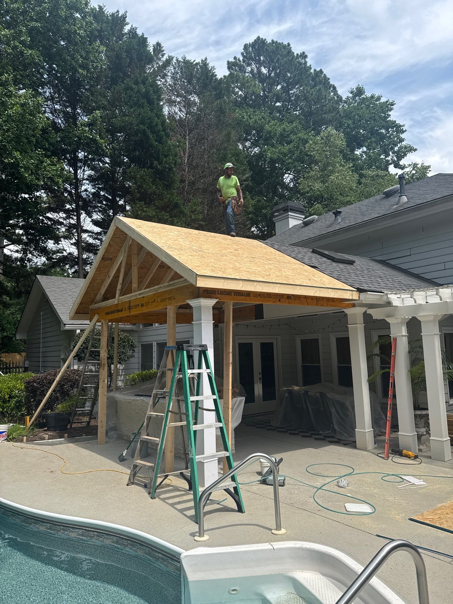Marietta Poolside Pavilion with Custom Outdoor Kitchen and Pergola by Swift Home Renovations