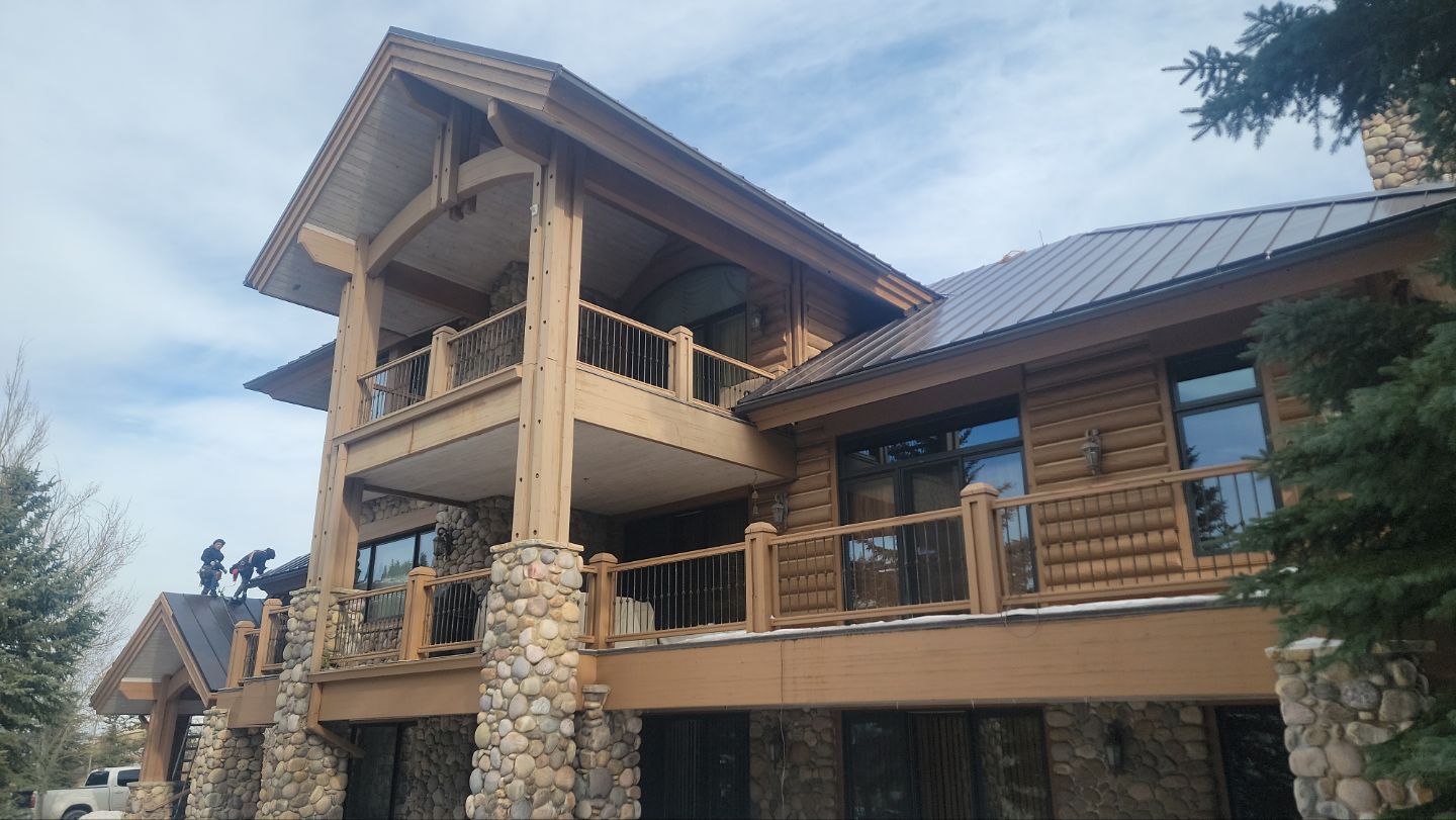 Standing Seam Metal Roof Replacement After Snow Damage by ASAP Roofing & Restoration