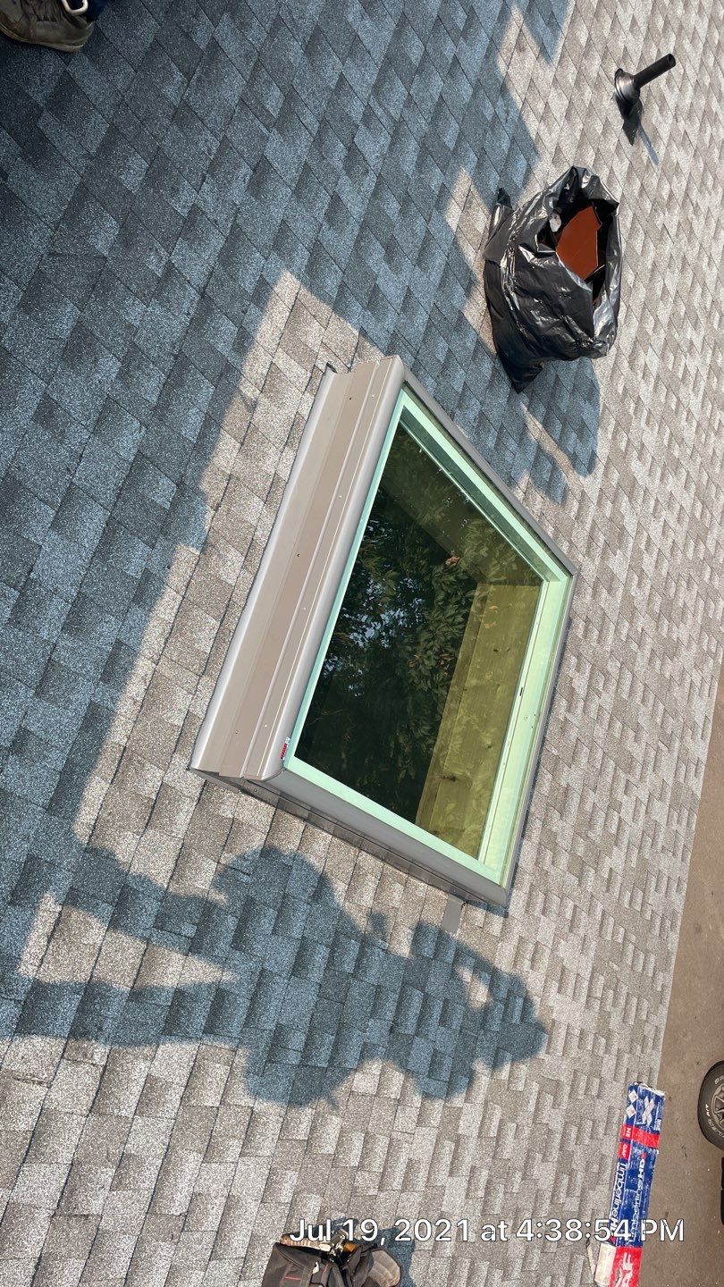 Deckhouse Roof Replacement by American Home Contractors