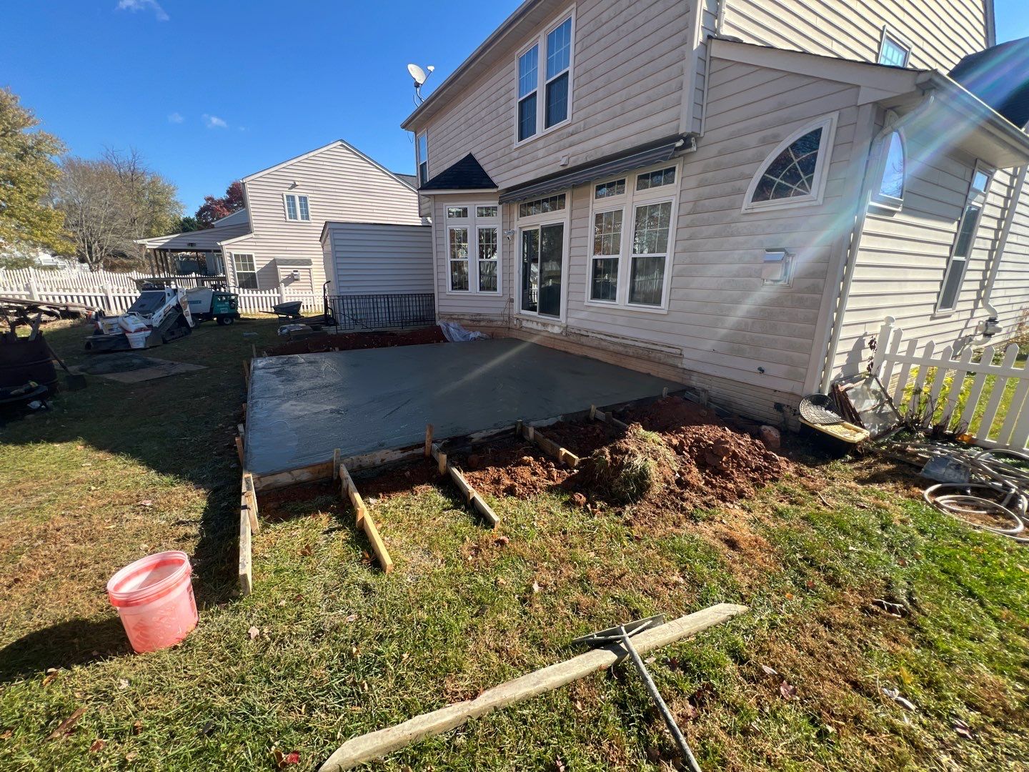 Custom Screened-In Porch with Stamped Concrete Patio in Warrenton by Jakari Restoration & Construction LLC