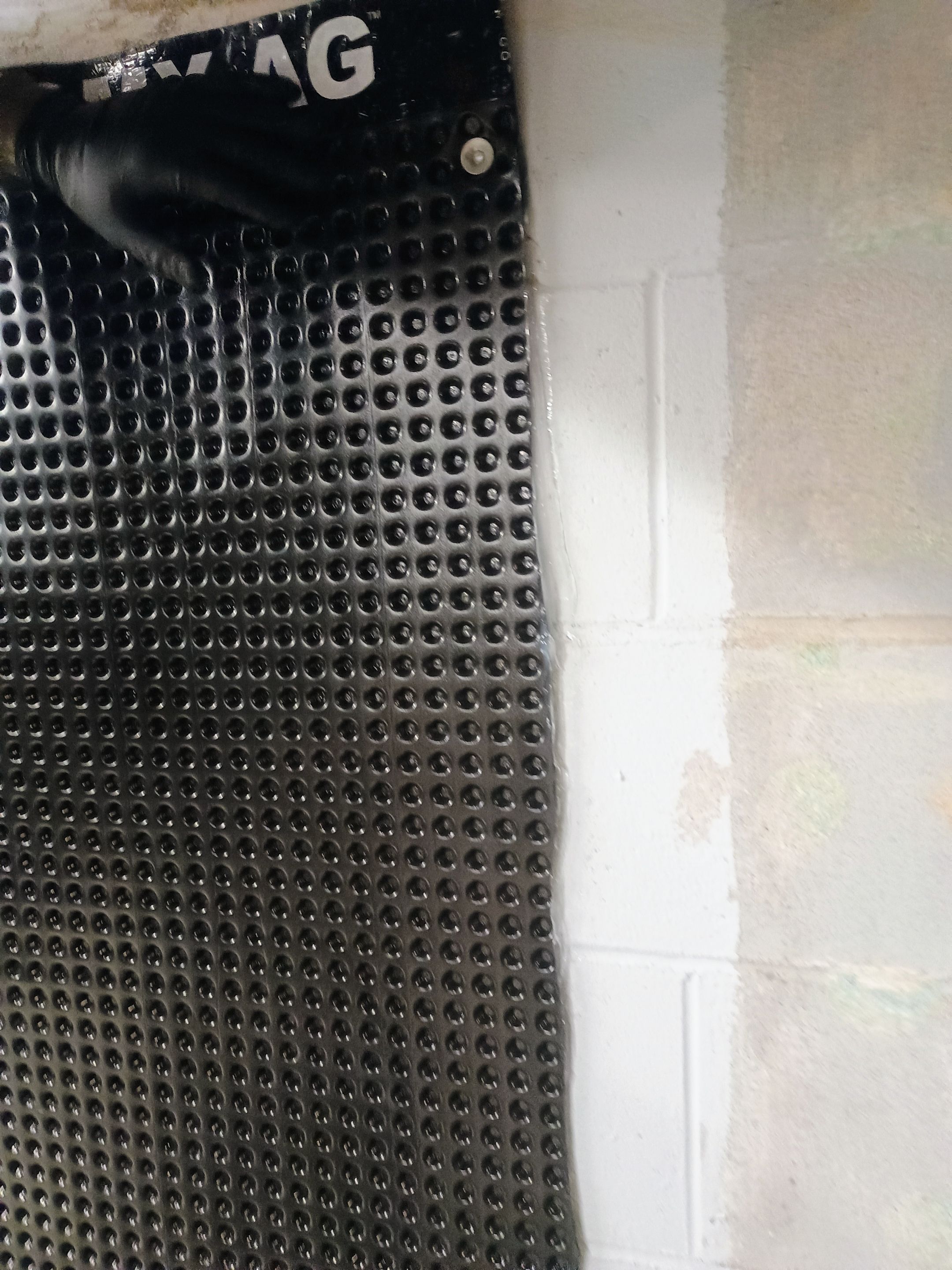 Depressurizing Denny's Basement Wall by Waterproofing Northeast