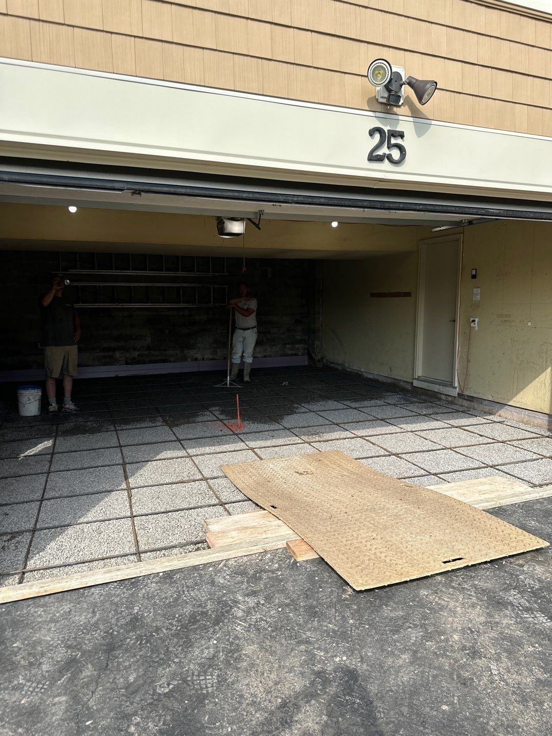 Concrete garage floor replacement  by NG Masonry & Construction LLC